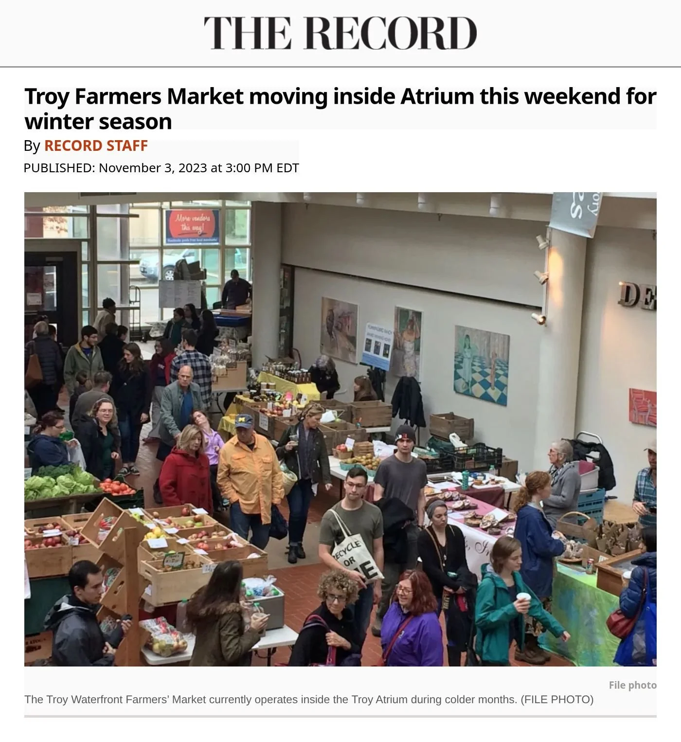 Troy Record website, Nov. 3, 2023: ‘Troy Farmers Market moving inside Atrium this weekend for winter season’, with a file photo of shoppers and vendors crowding the market inside the Troy Atrium.