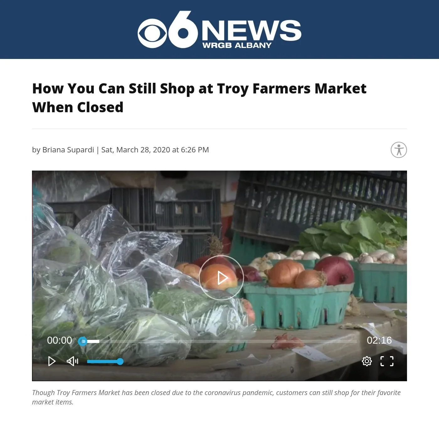 CBS6 Albany website, March 28, 2020: 'How You Can Still Shop at Troy Farmers Market When Closed' by Briana Supardi, with a video frame of bagged greens, onions and mushrooms in green quart boxes on a farm stand table.