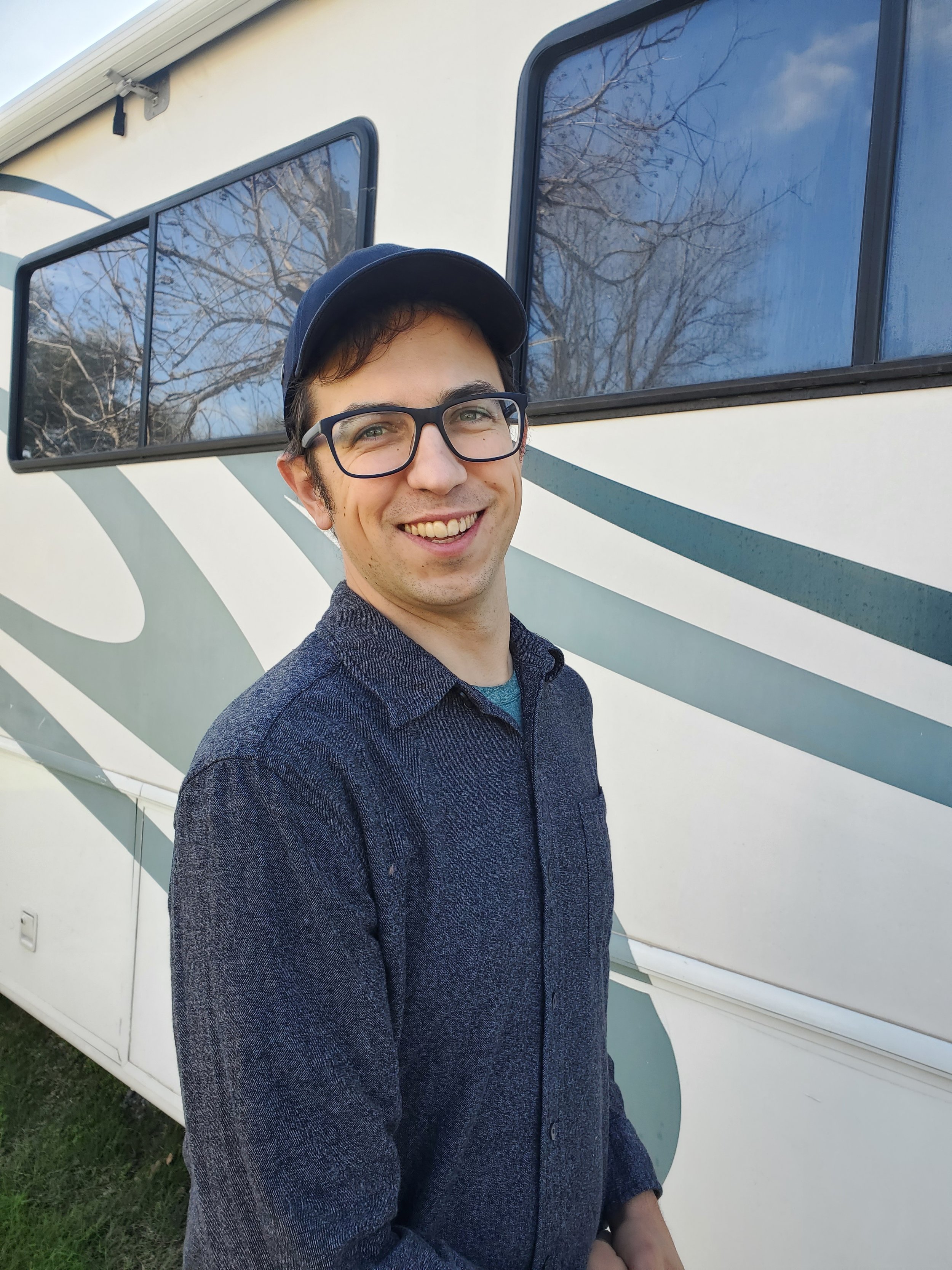 Jairus in front of RV