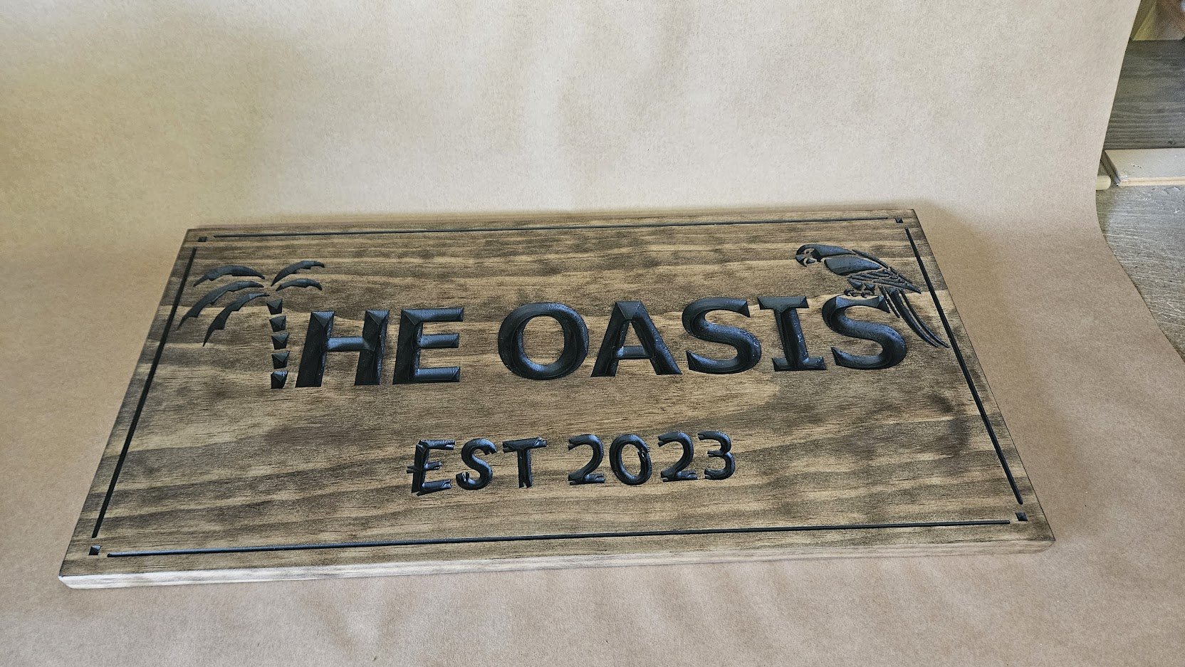 The oasis - palm tree and parrot outdoor backyard sign