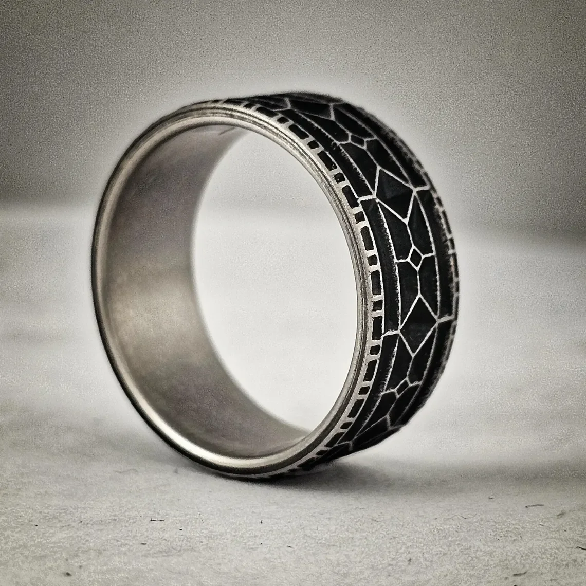 Battleworn Titanium Viking Wedding Ring - 9mm Rampart Design (2).webp