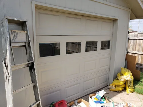 The original white garage door.