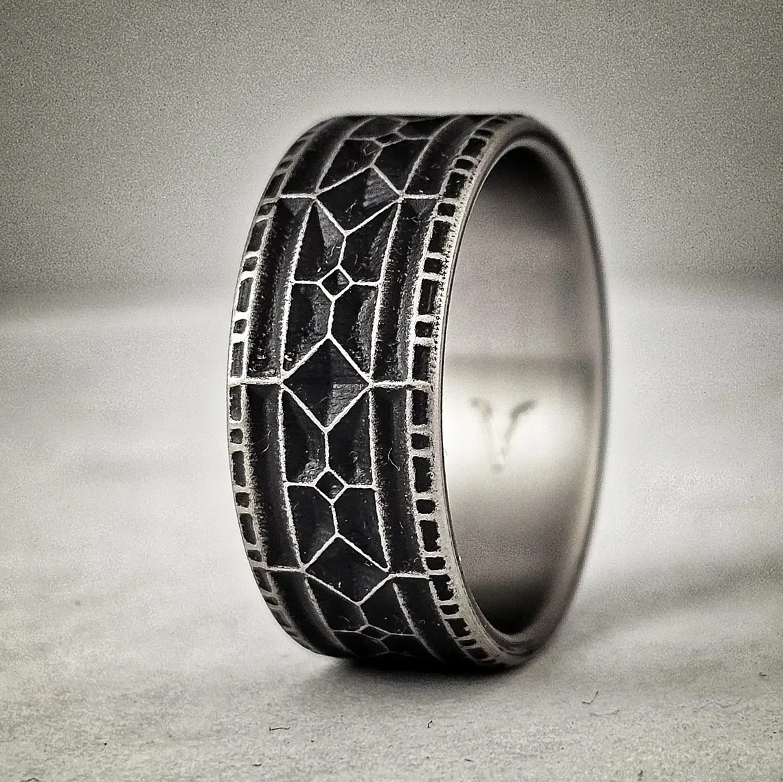 Battleworn Titanium Viking Wedding Ring - 9mm Rampart Design (3).webp