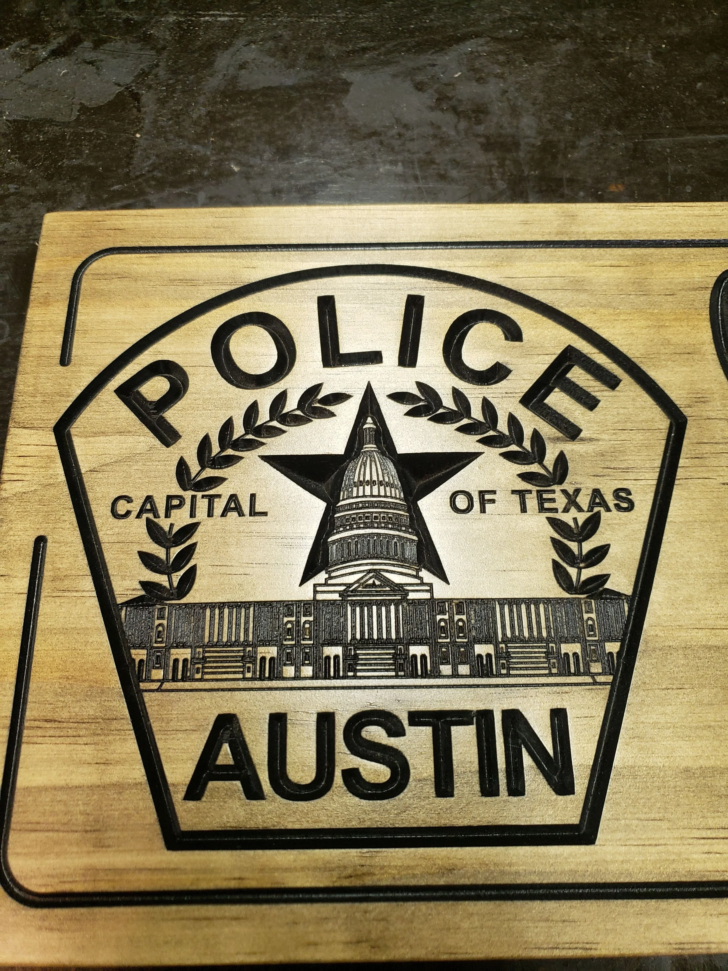 wooden police emblem austin