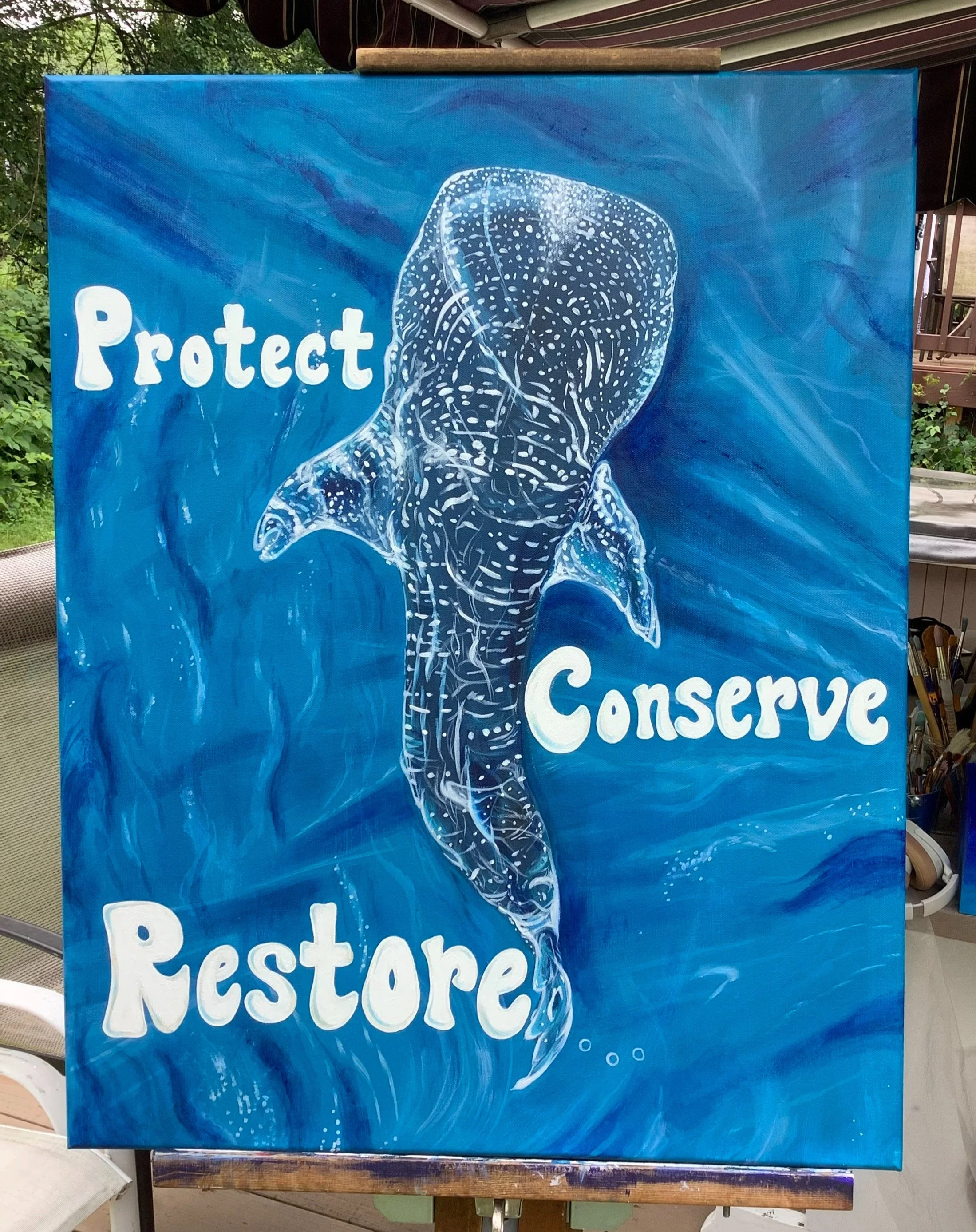 Painting of a whale shark in the ocean that reads "Protect, Conserve, Restore"