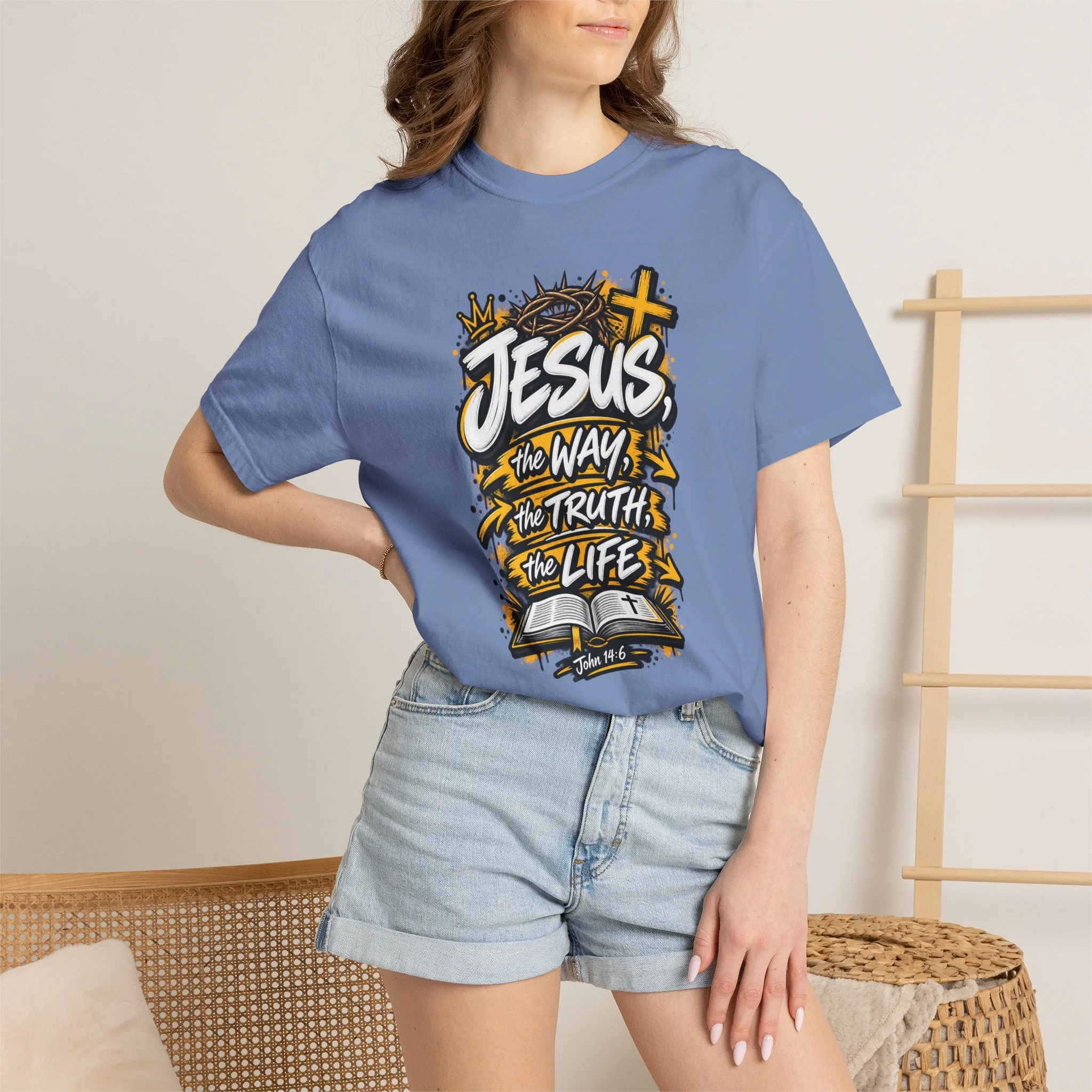Unisex t-shirt with bold yellow and white graffiti art featuring a crown of thorns, a cross, an open Bible, and the text 'Jesus, The Way, The Truth, The Life'