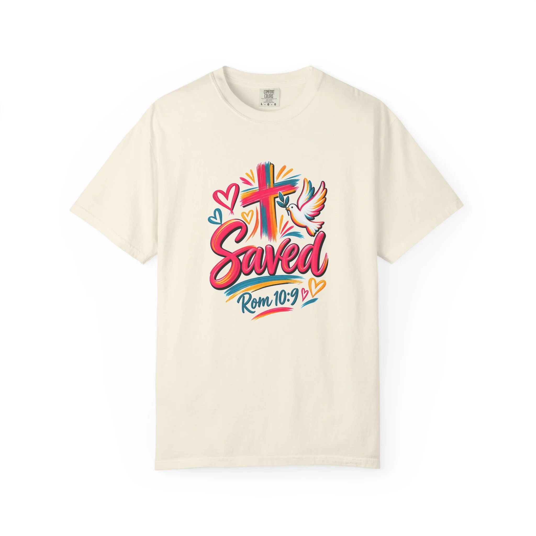 Beige colorful t-shirt featuring bright floral artwork, a cross, a dove holding an olive branch, and the word 'Saved' with 'Rom 10:9'.