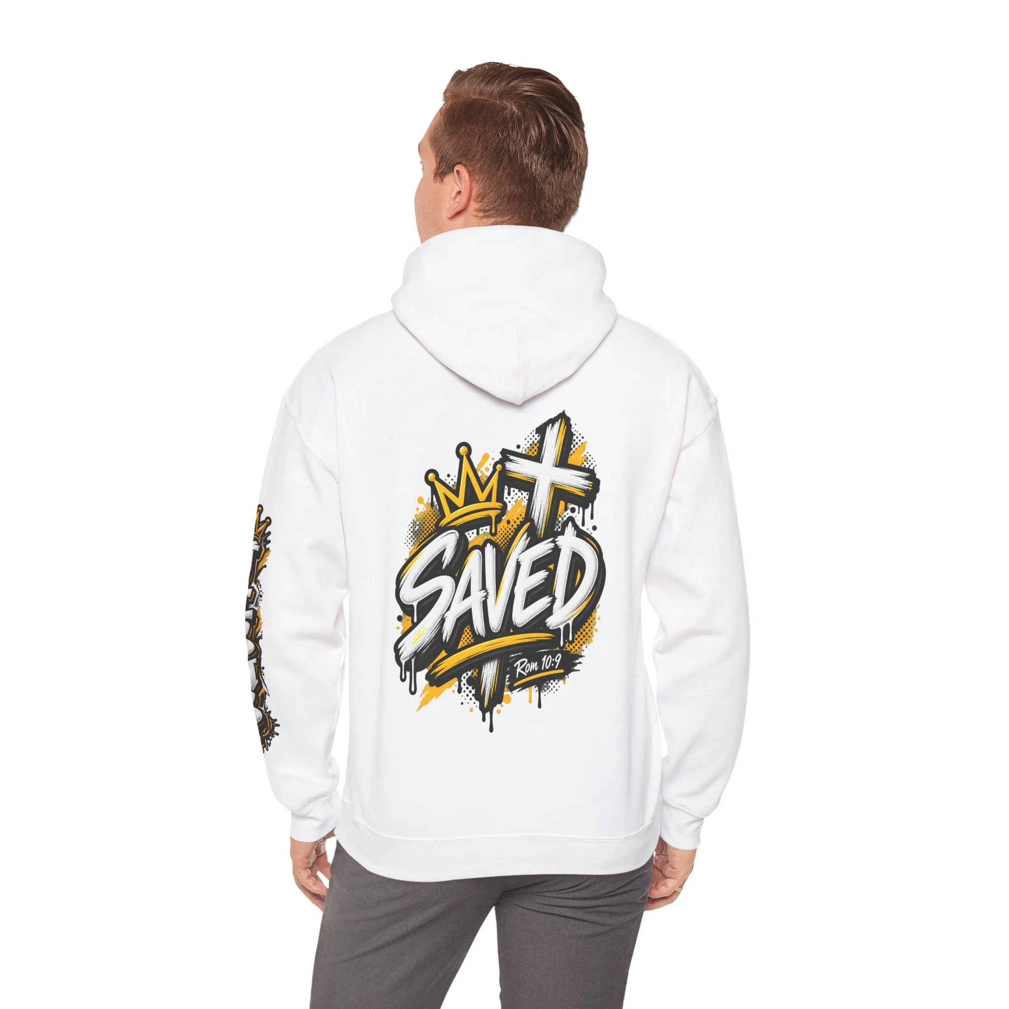 White Unisex streetwear hoodie featuring bold graffiti-style 'SAVED' lettering, a crown, a cross, halftone patterns, and 'Rom 10:9'.
