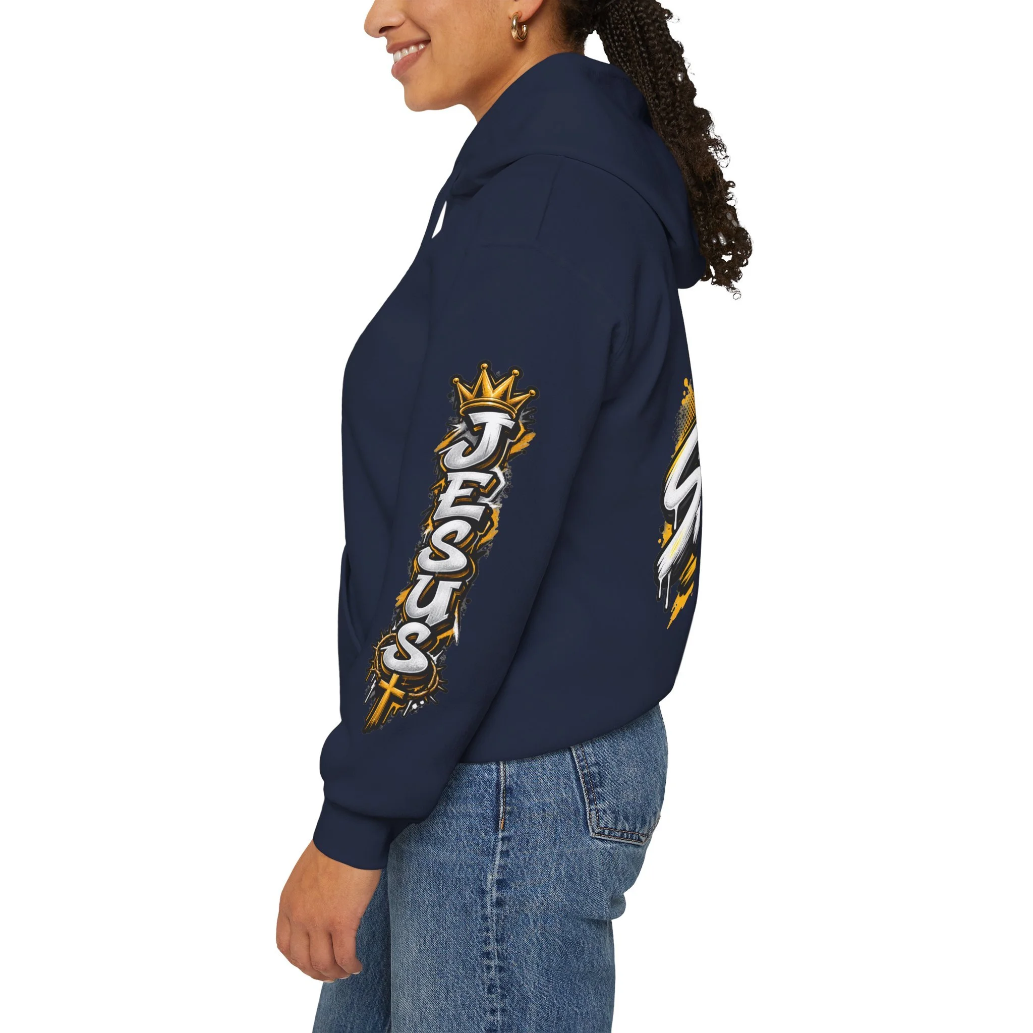 Navy Blue Unisex streetwear hoodie featuring bold graffiti-style 'SAVED' lettering, a crown, a cross, halftone patterns, and 'Rom 10:9'.
