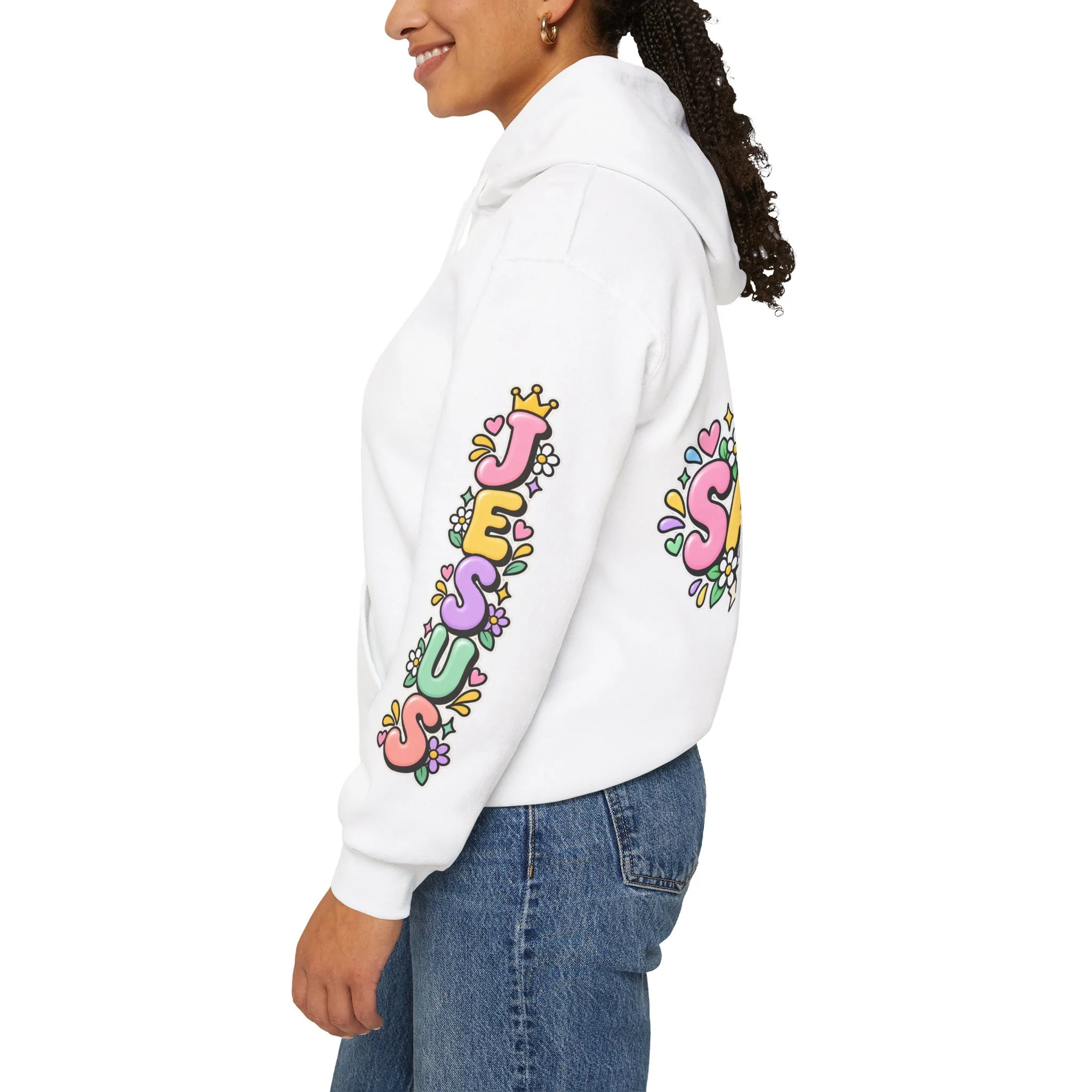 White Unisex pastel hoodie featuring cute 3D bubble letters spelling SAVED with flowers, hearts, a wooden cross, and a banner reading ROM 10:9.