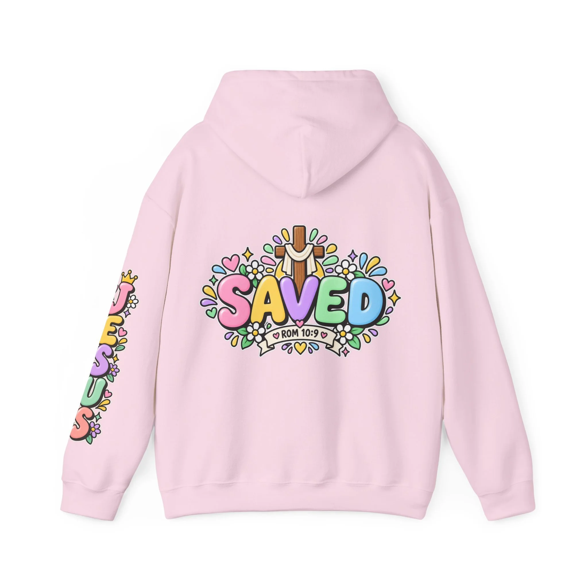 Light Pink Unisex pastel hoodie featuring cute 3D bubble letters spelling SAVED with flowers, hearts, a wooden cross, and a banner reading ROM 10:9.