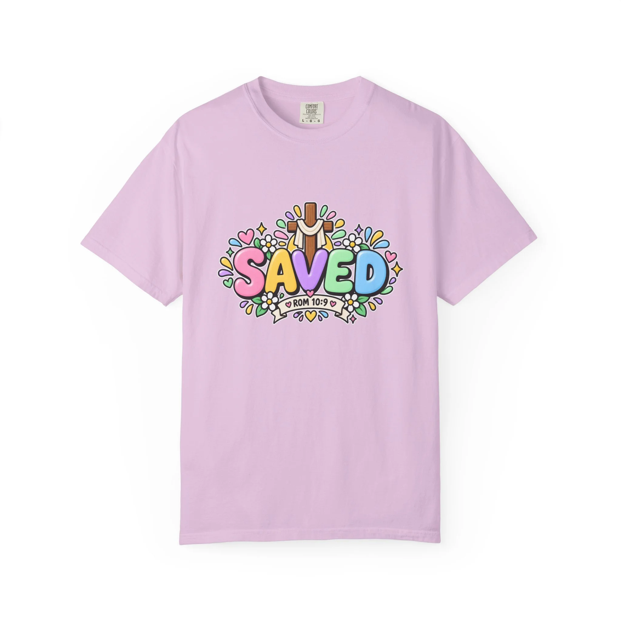 Orchid pastel hoodie featuring cute 3D bubble letters spelling SAVED with flowers, hearts, a wooden cross, and a banner reading ROM 10:9.