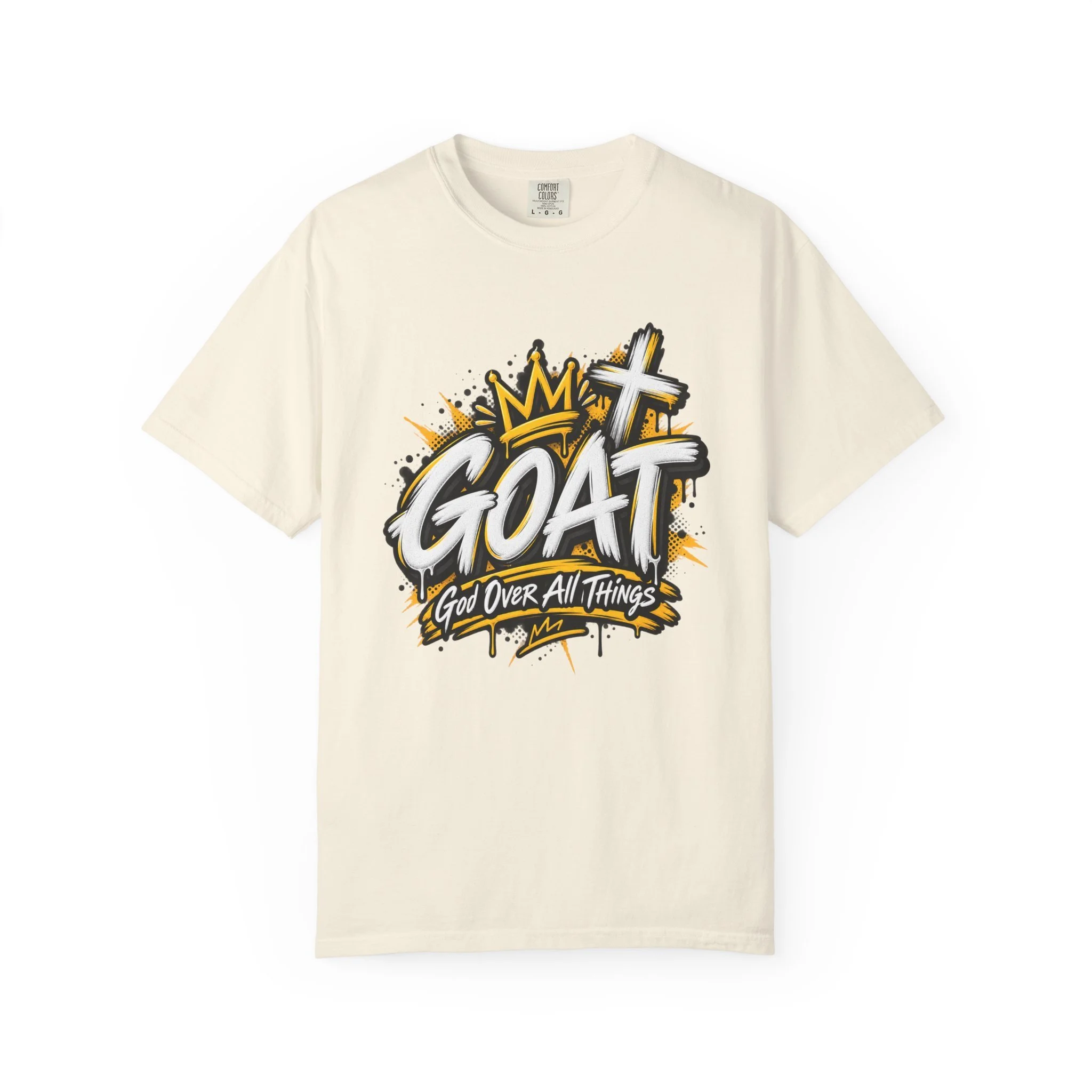 Sand unisex t-shirt featuring yellow and white graffiti lettering spelling GOAT, a crown, a cross, and 'God Over All Things'.