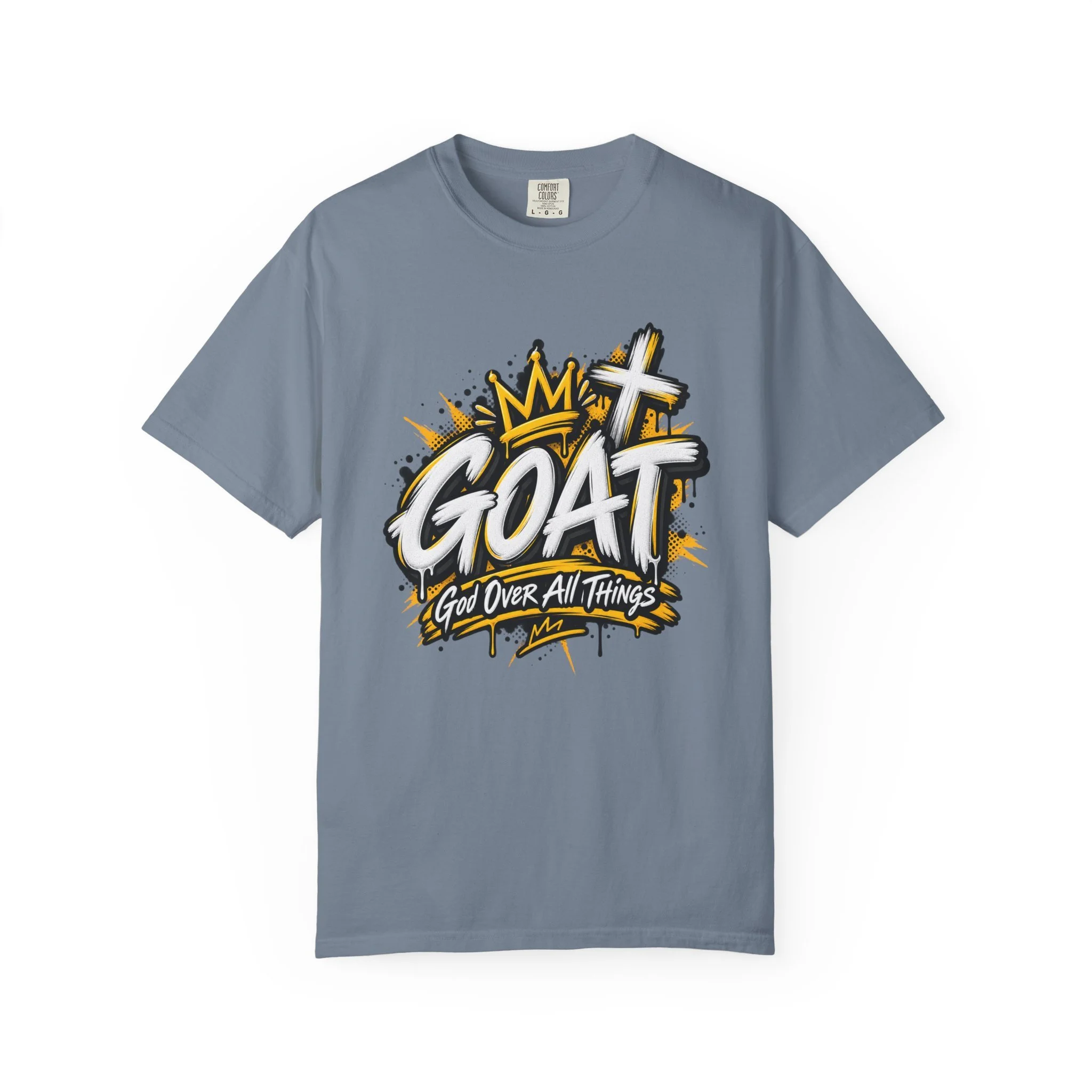 Denim blue unisex t-shirt featuring yellow and white graffiti lettering spelling GOAT, a crown, a cross, and 'God Over All Things'.