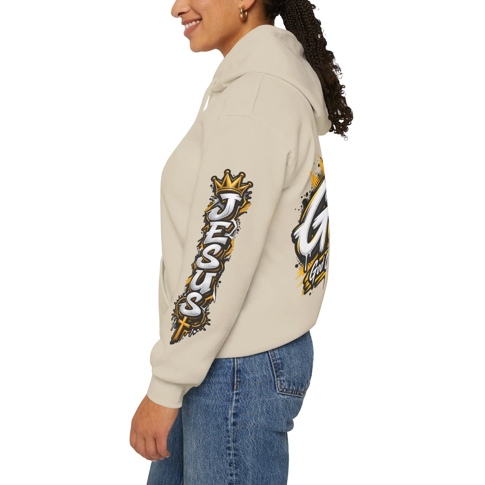 Sand unisex streetwear hoodie featuring yellow and white graffiti lettering spelling GOAT, a crown, a cross, and 'God Over All Things'.