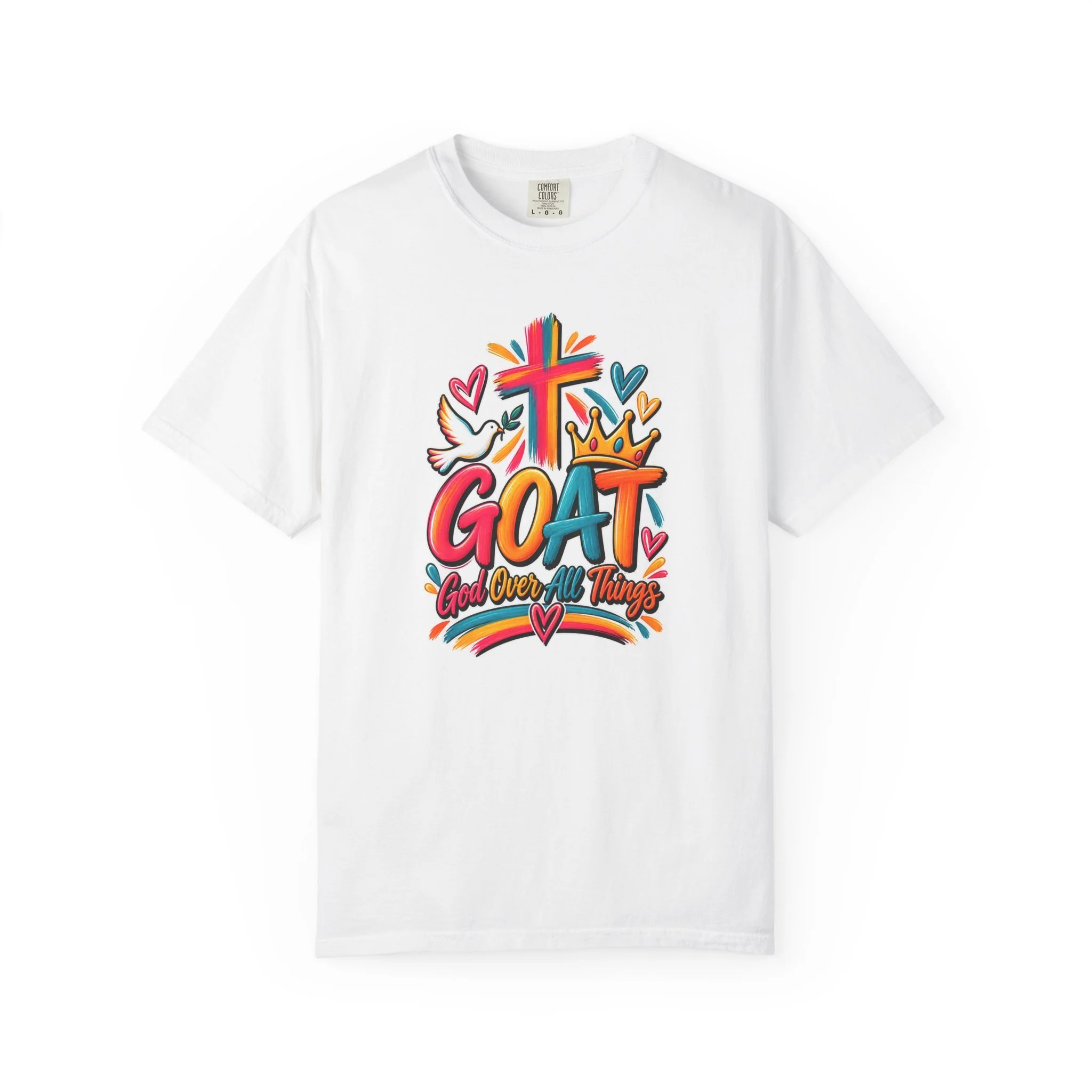 White unisex t-shirt graphic showing bright, colorful modern script that reads GOAT and "God Over All Things", accented with a painted cross, crown, hearts, and a dove.