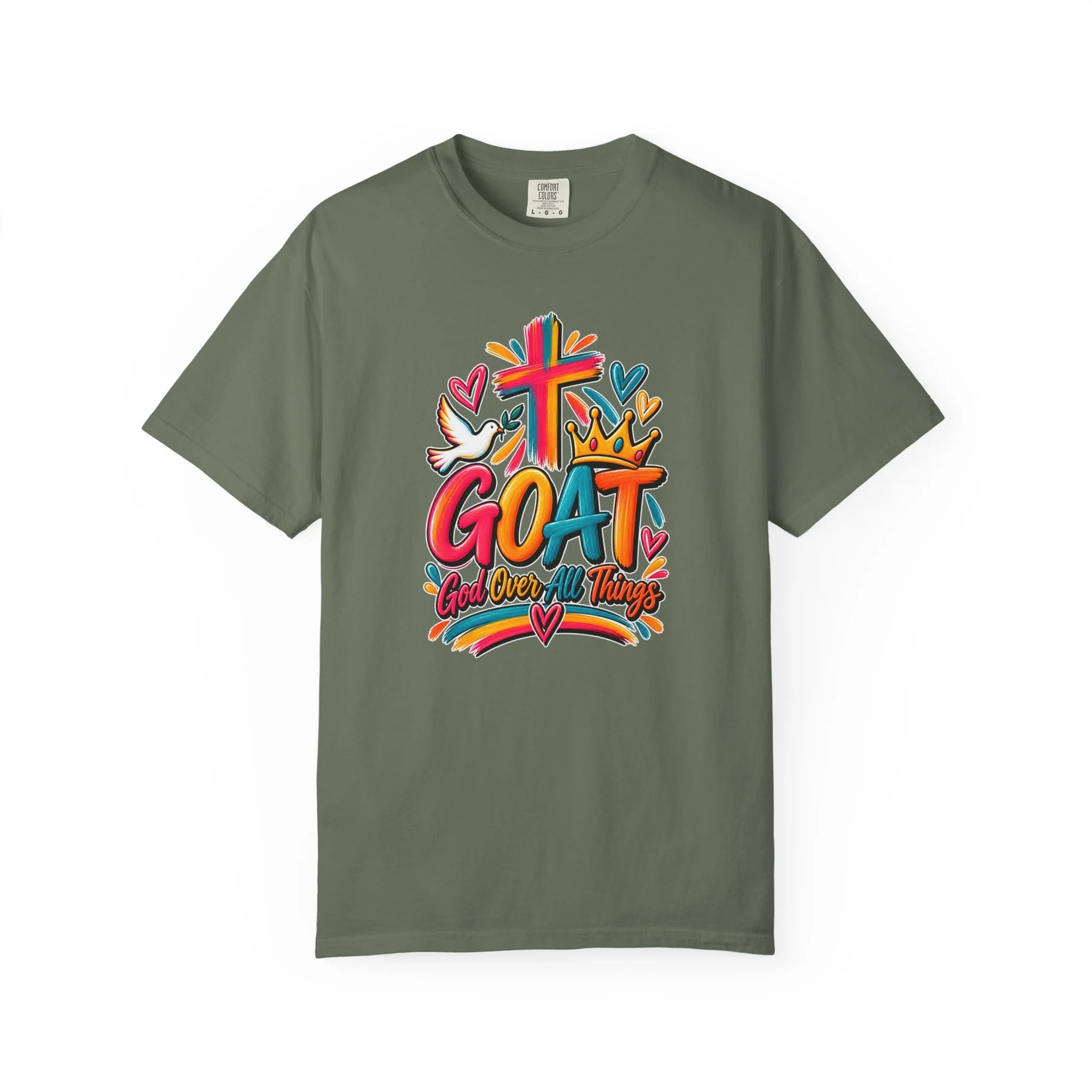 Military green unisex t-shirt graphic showing bright, colorful modern script that reads GOAT and "God Over All Things", accented with a painted cross, crown, hearts, and a dove.