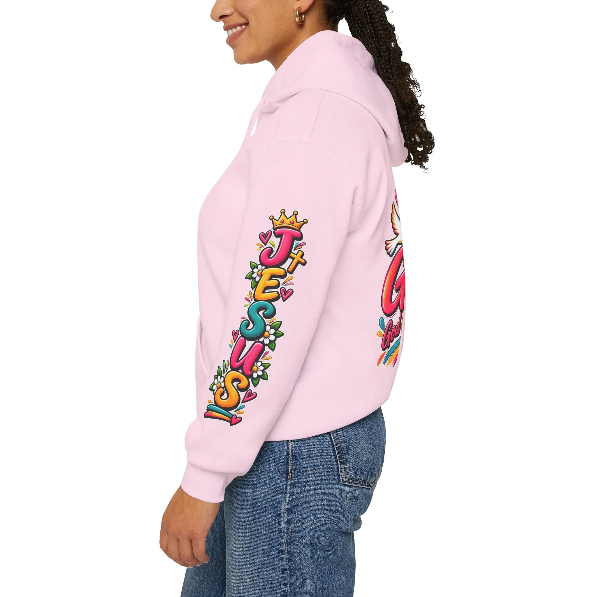 Pink unisex hoodie featuring colorful, vivid modern lettering spelling GOAT with a cross, a crown, hearts, a dove, and a banner reading "God Over All Things".