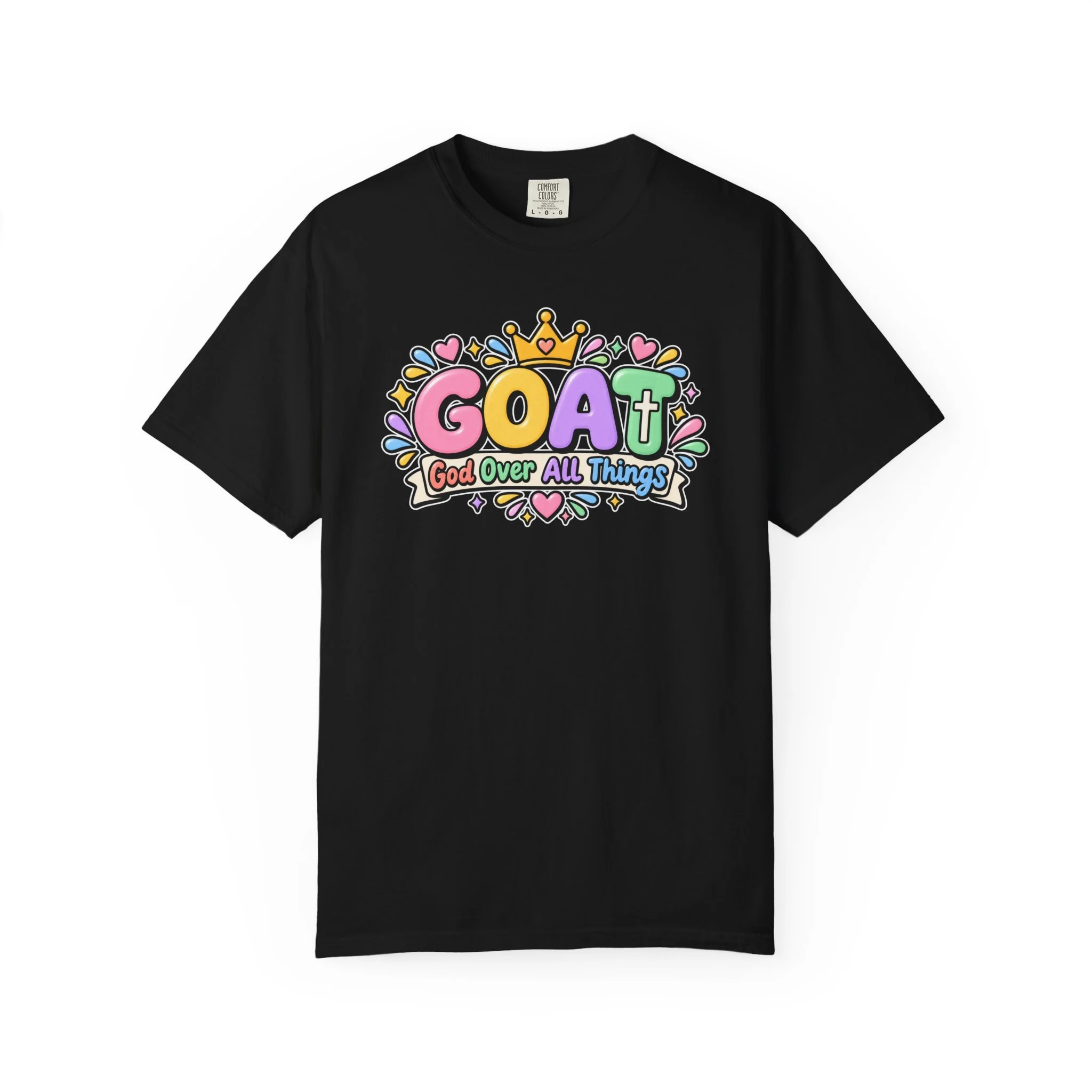 Black unisex t-shirt graphic showing cute 3D pastel bubble letters spelling GOAT, a yellow crown with a heart, hearts, sparkles, and a banner below that reads "God Over All Things".