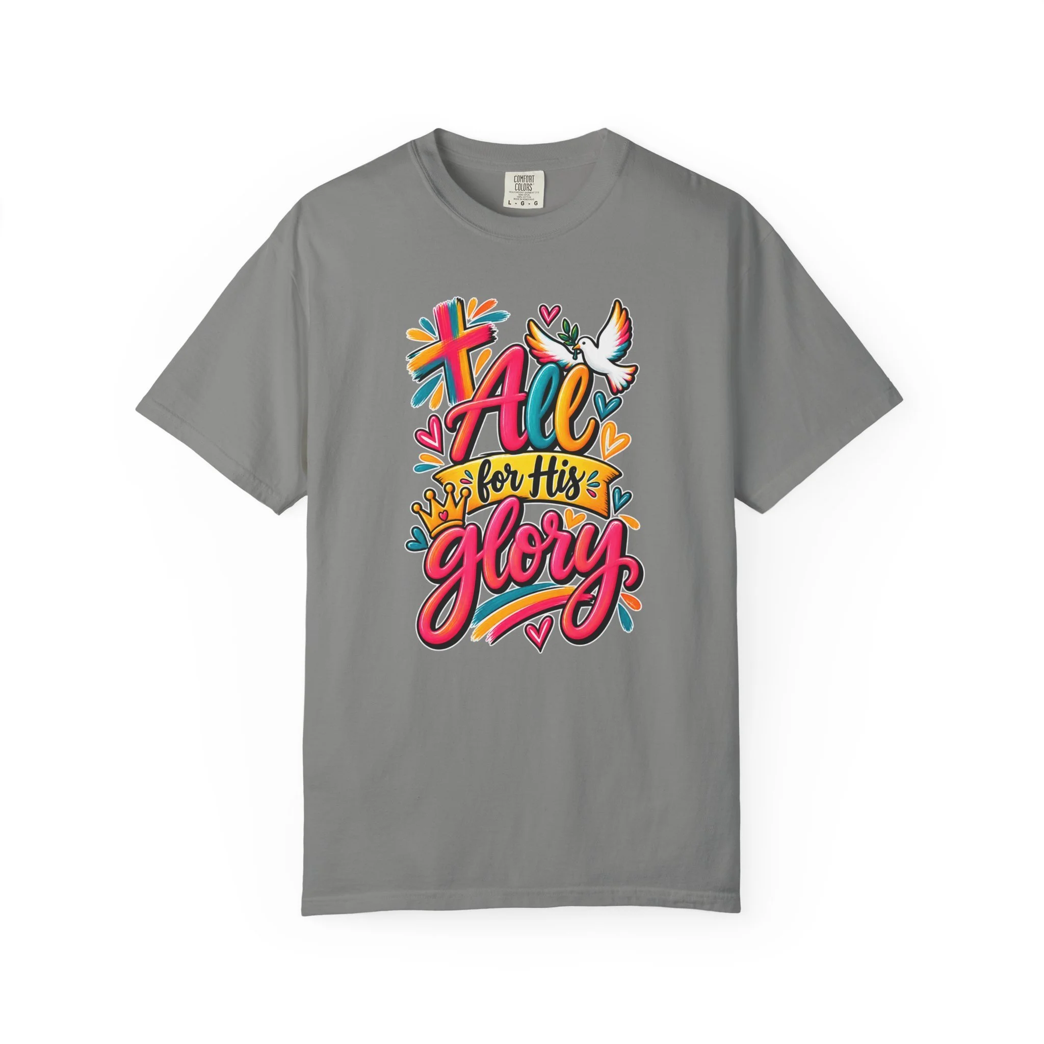 Green unisex t-shirt graphic showing bright, colorful modern handwriting spelling "All for His Glory", surrounded by a painted cross, a crown, hearts, and a white dove