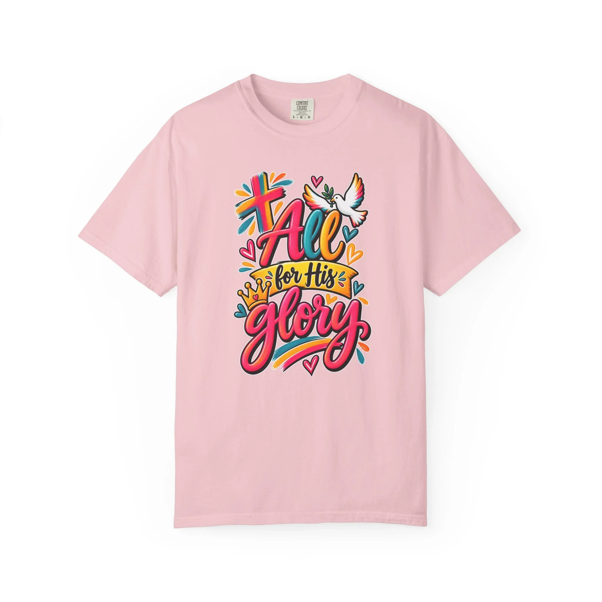 Light pink unisex t-shirt graphic showing bright, colorful modern handwriting spelling "All for His Glory", surrounded by a painted cross, a crown, hearts, and a white dove