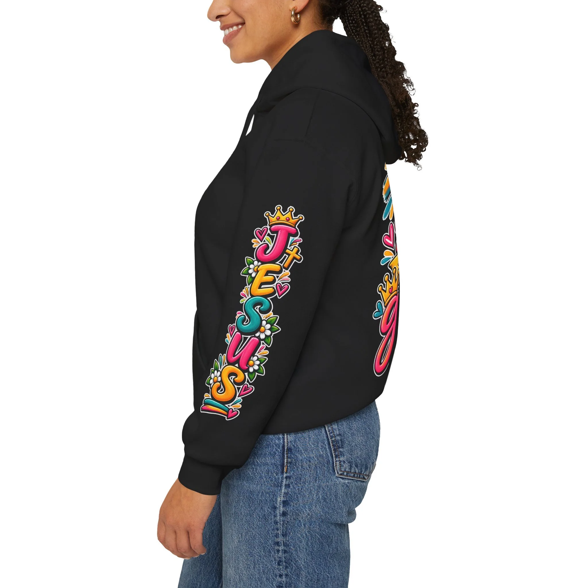 Black unisex hoodie featuring vibrant, colorful modern script that reads "All for His Glory", accented with a painted cross, a crown, a dove carrying an olive branch, and hearts.