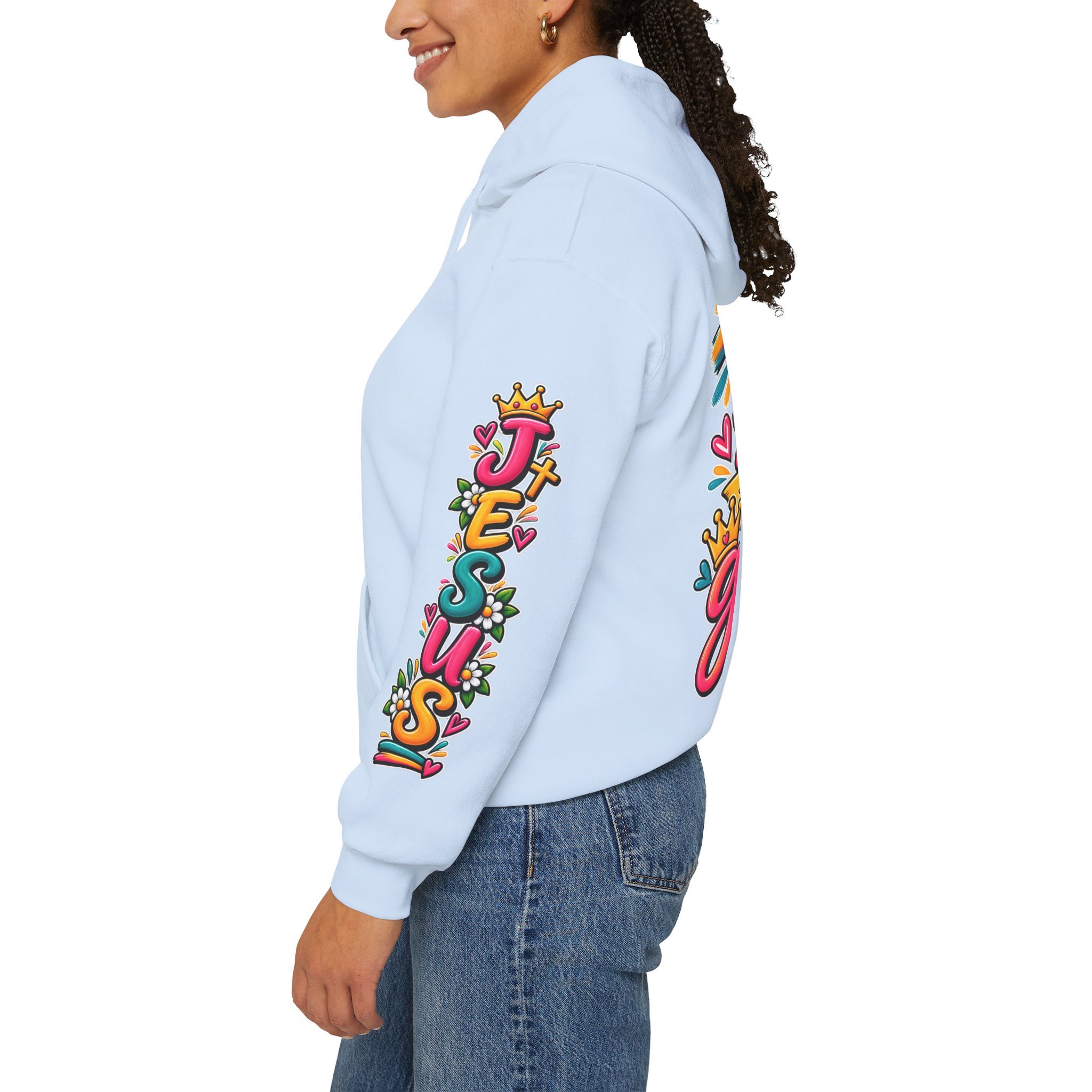 Light blue unisex hoodie featuring vibrant, colorful modern script that reads "All for His Glory", accented with a painted cross, a crown, a dove carrying an olive branch, and hearts.