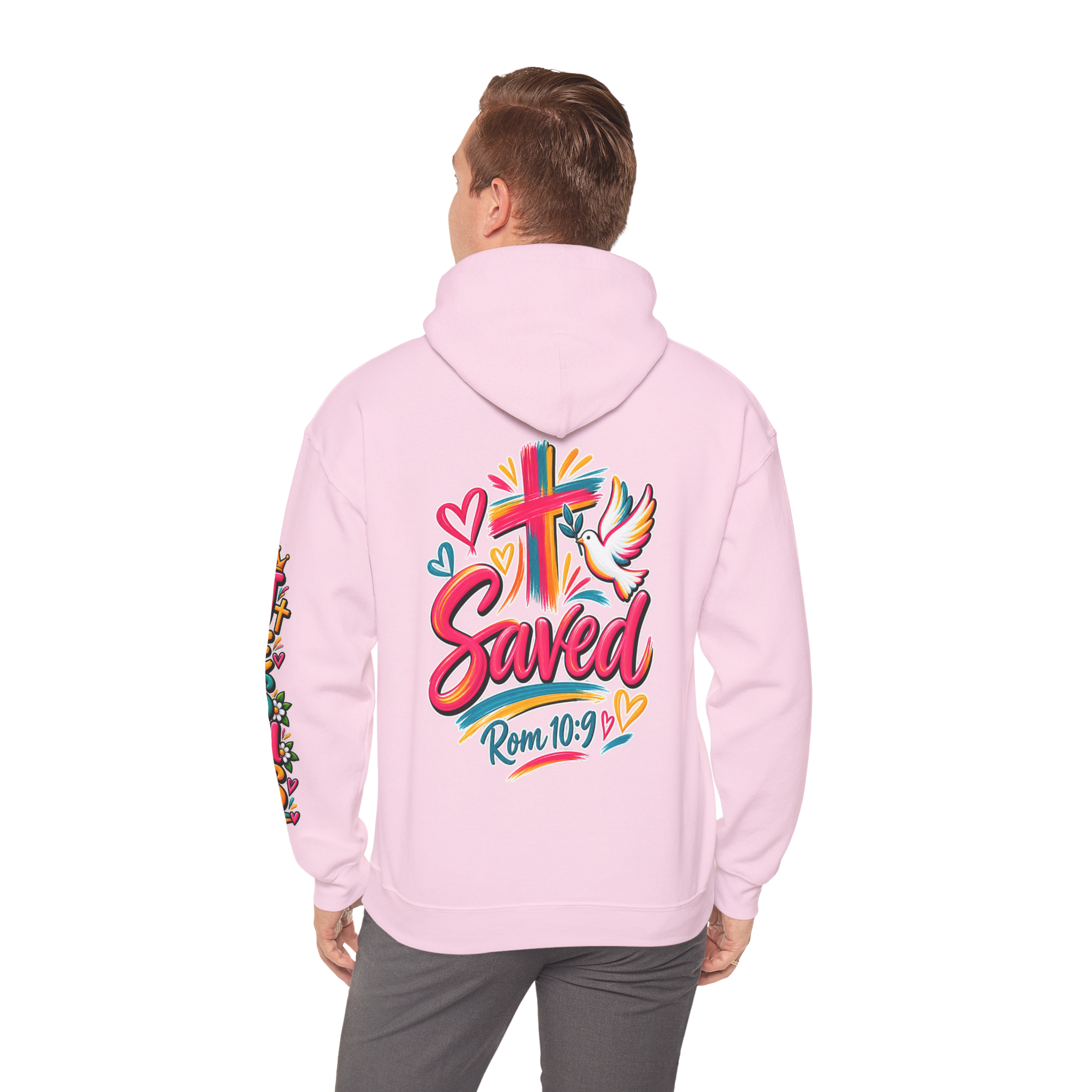 Light Pink Unisex colorful hoodie featuring bright floral artwork, a cross, a dove holding an olive branch, and the word 'Saved' with 'Rom 10:9'.