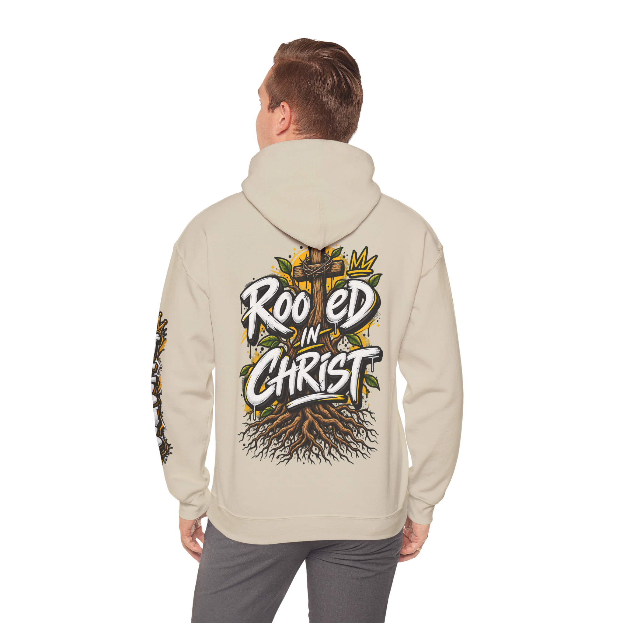 Unisex black hoodie featuring a vibrant graffiti-style 'Rooted in Christ' design with a cross, tree roots, and a crown.
