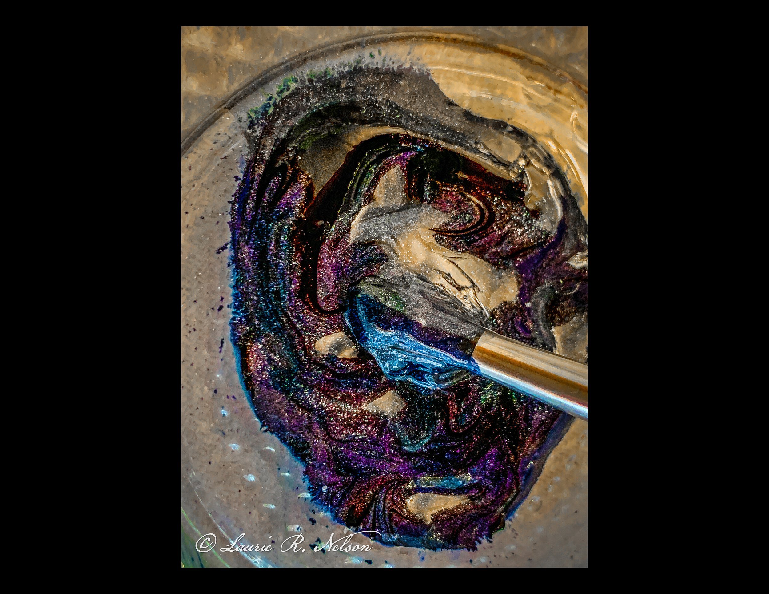 Mixing up gemstone paint of Amethyst and Kyanite to be added to Kaya's Lotus Drum of Peace.