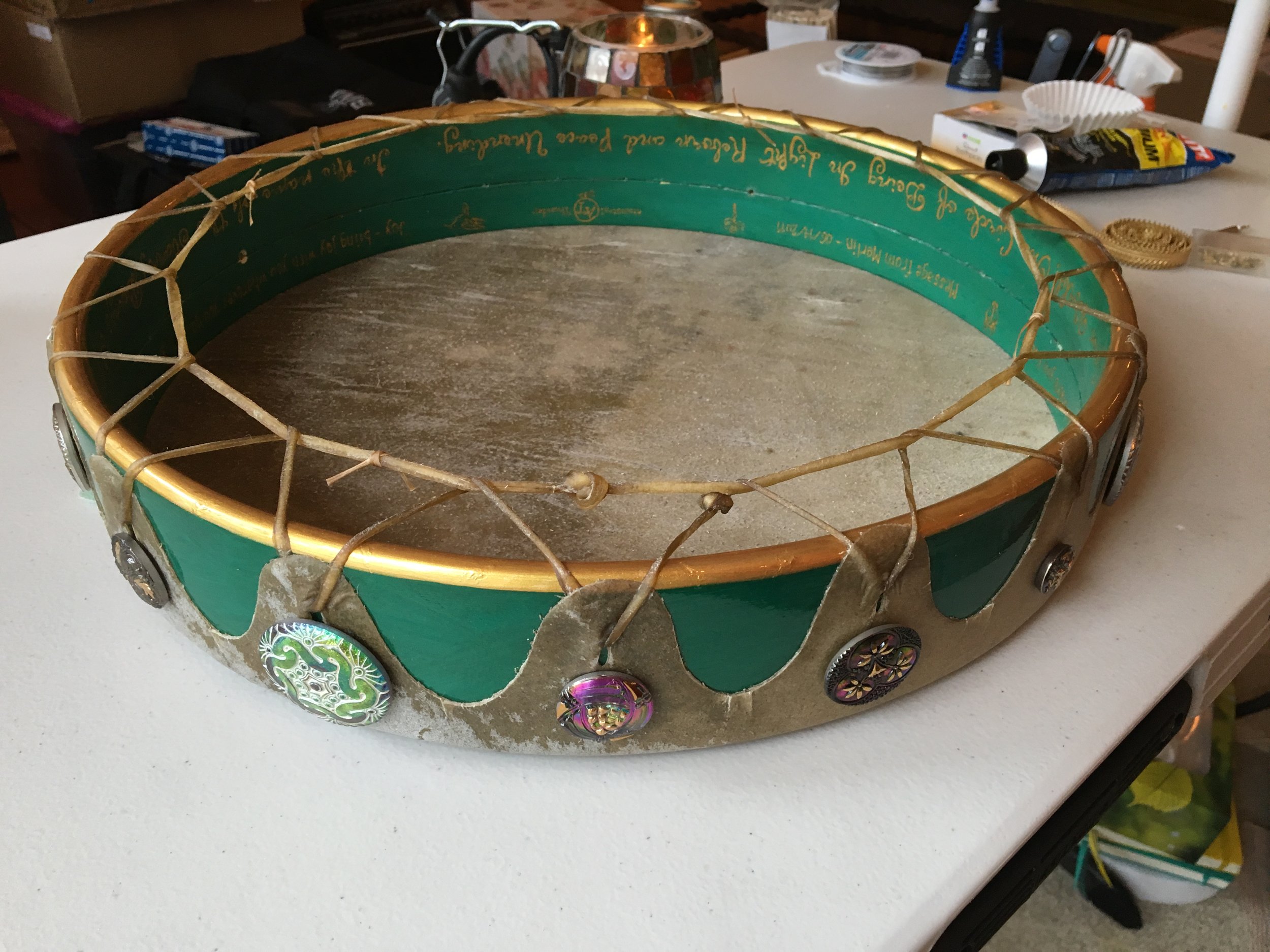 The back of Jeannie's "Blessings of Bridhid" Drum, awaiting the Brighid's cross hand-hold with her sacred Stone Person.