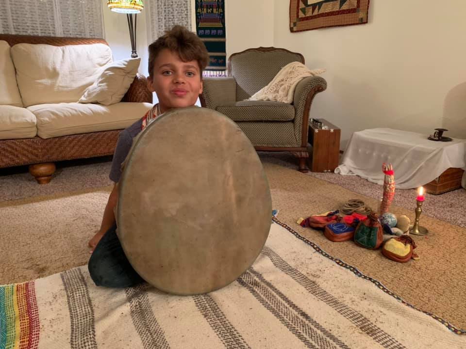 Rowan: Sámi Drum: Freshly Birthed and still heavy with Waters, Rowan picked up his Drum and exclaimed, “Wow, I am going to have to work out more!” The Drum was the same size as he, sitting down! What a powerful, beautiful Drum.