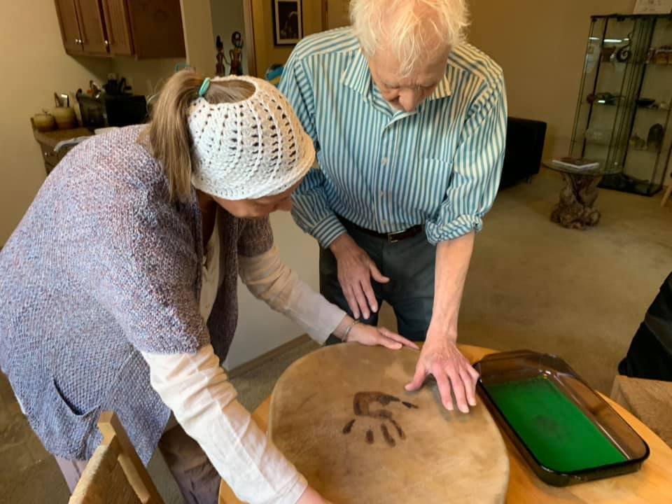 Our family Grancestor’s Drum: Years after we added my Mama’s handprint to the Drum, my Ancestors and Guides clearly told me that my father’s handprint HAD to be added THAT DAY. Rushing home to get the Drum, we set up the ink and asked Papa to add his