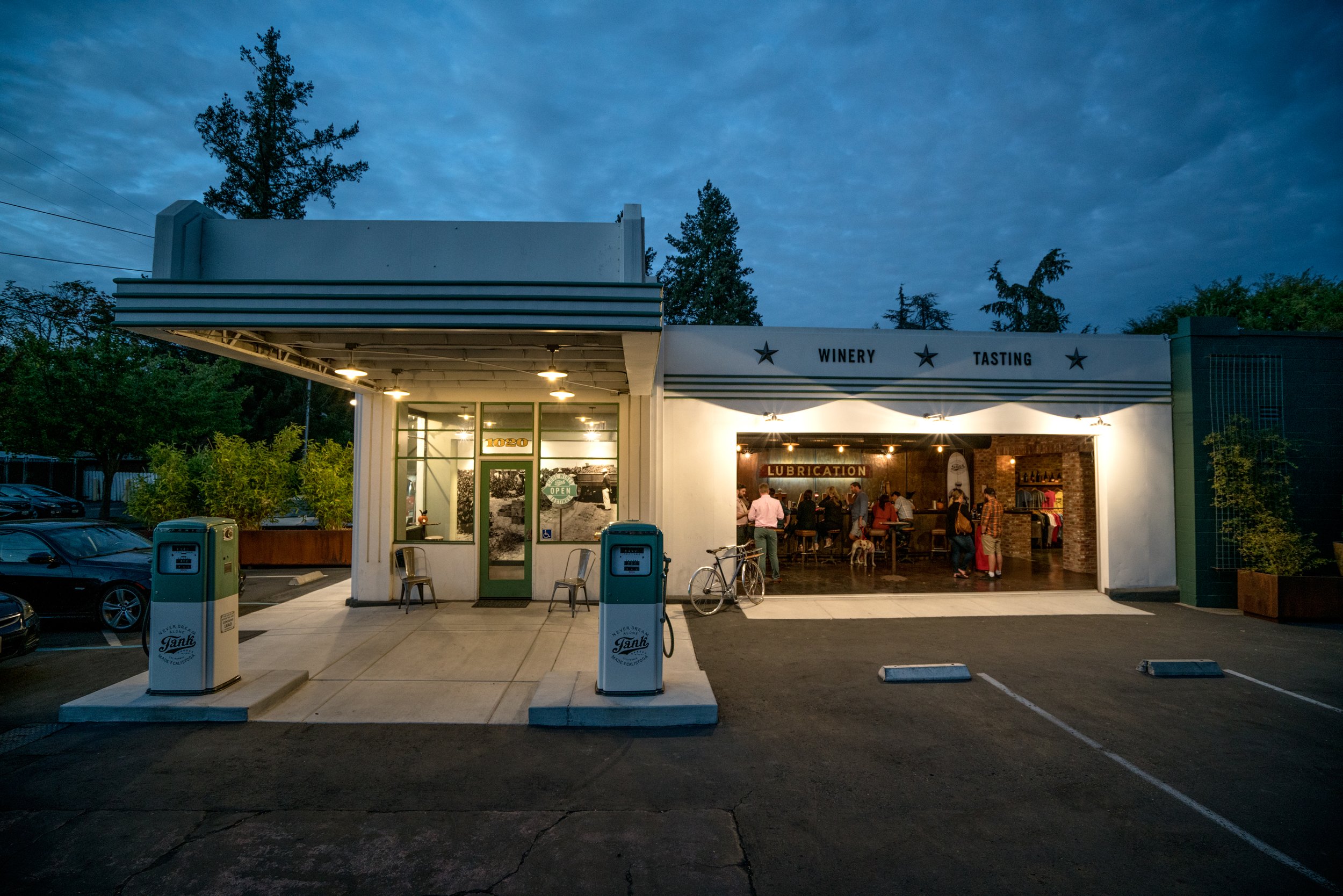 Tank Garage Winery tasting room in Calistoga, California, showcasing a relaxed wine country atmosphere and hospitality experience in Napa Valley.