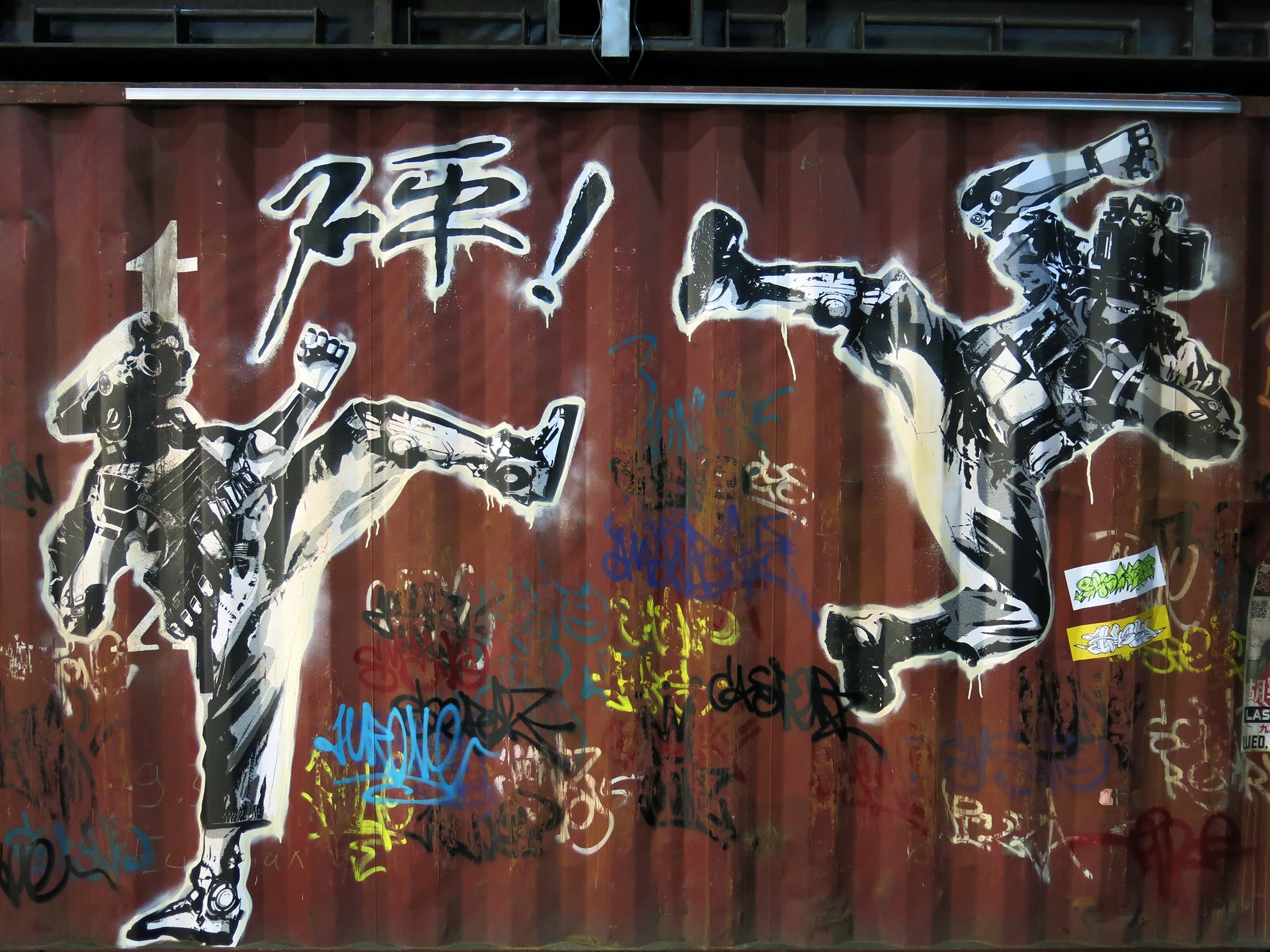 Shang Chi: Macau nightclub graffiti stencil ' Robot Fight'