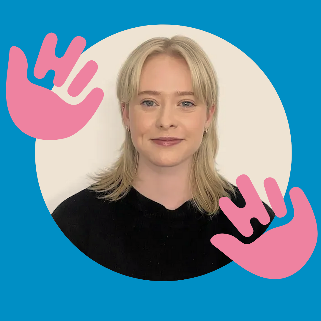 Image of woman with blonde hair and blue eyes smiling