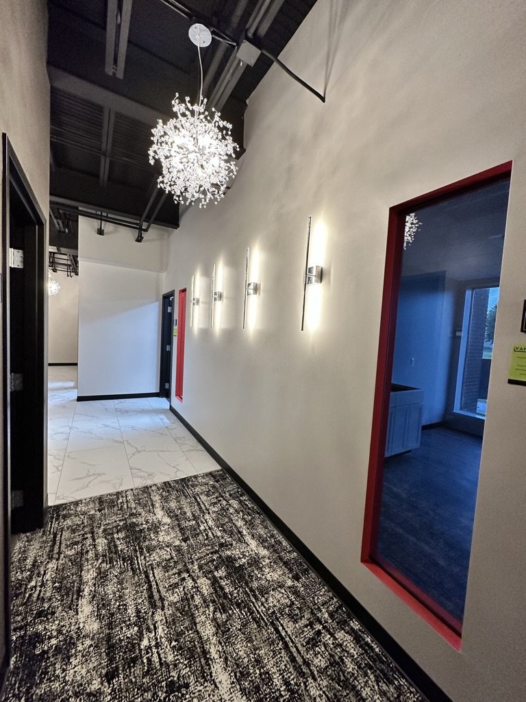 View from East hallway looking towards kitchen area.