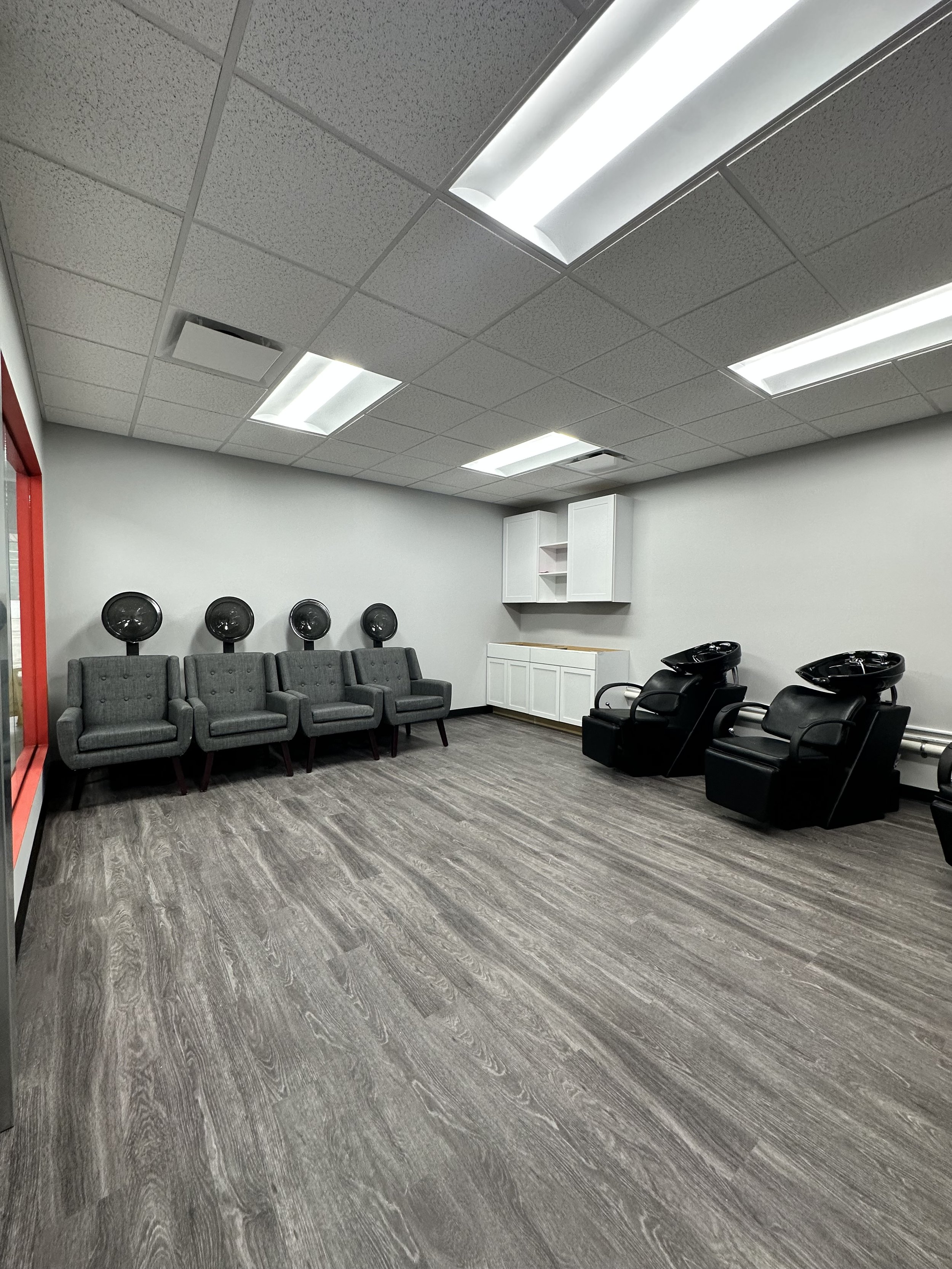 Inside our shared shampoo bowl and hair dryer room (featured tenant amenity).