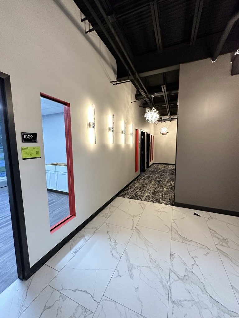 View from open kitchen area looking down the East hallway.