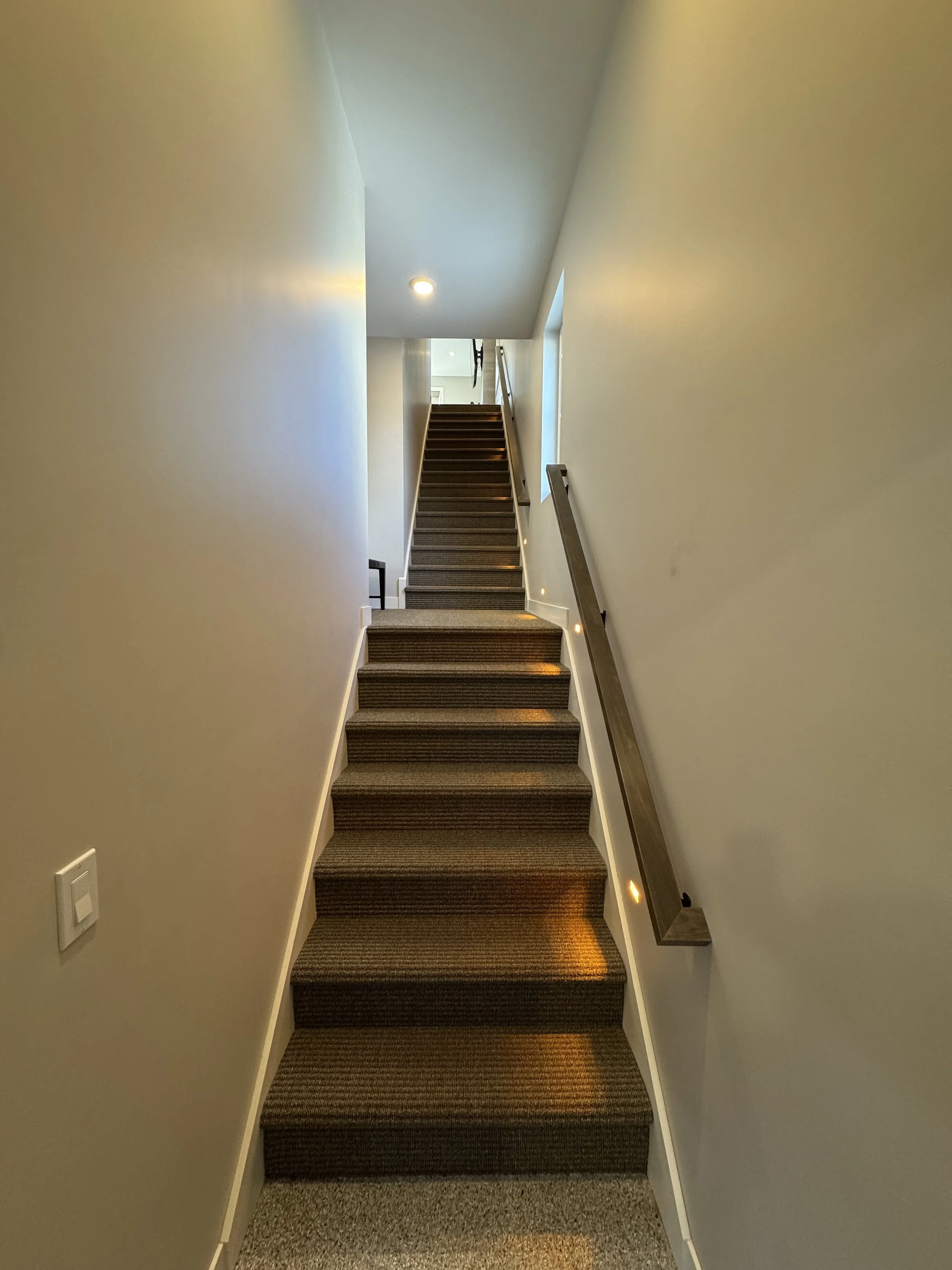 26. Stairs from garage to living space.jpg