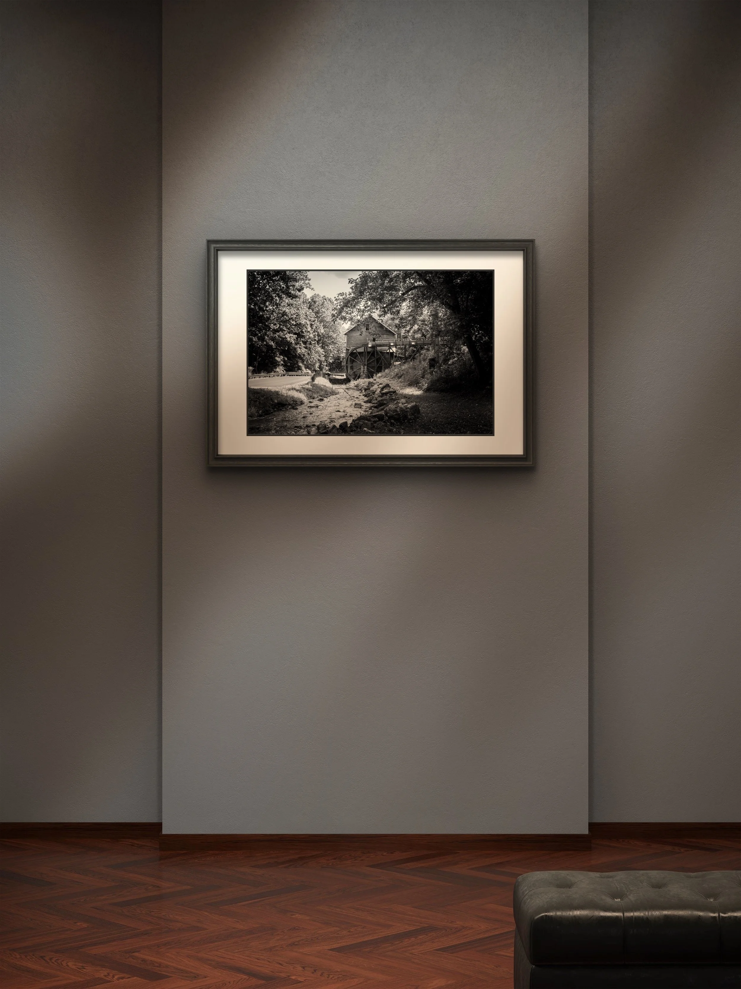 Yevette Lynn fine art photographer presents black and white photograph of historic watermill along wooded creek, framed wall art with timeless, rustic character.