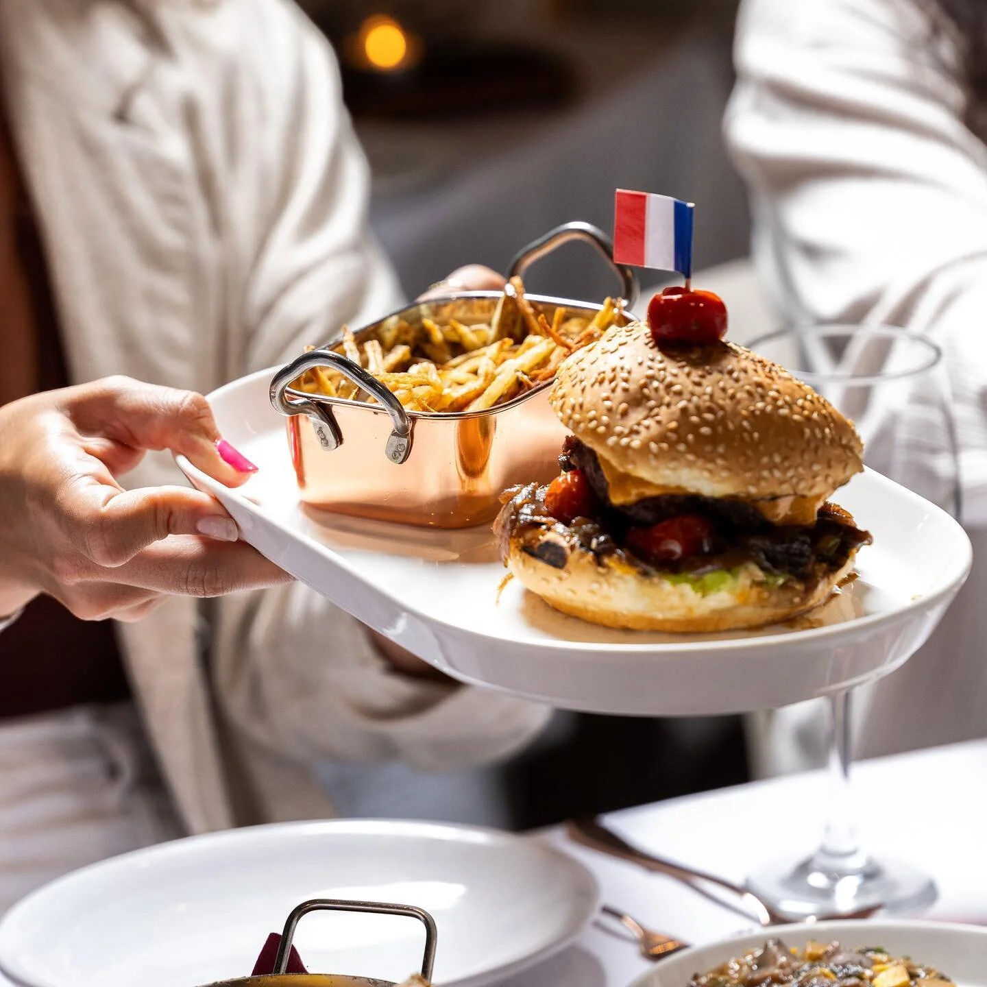 Savor the exquisite taste of perfection with our Glatt Kosher Wagyu Burger at @ostrowbrasserie . a culinary delight that leaves a lasting impression. • • • • #KosherGourmet #WagyuWonder #OstrowBrasserie"