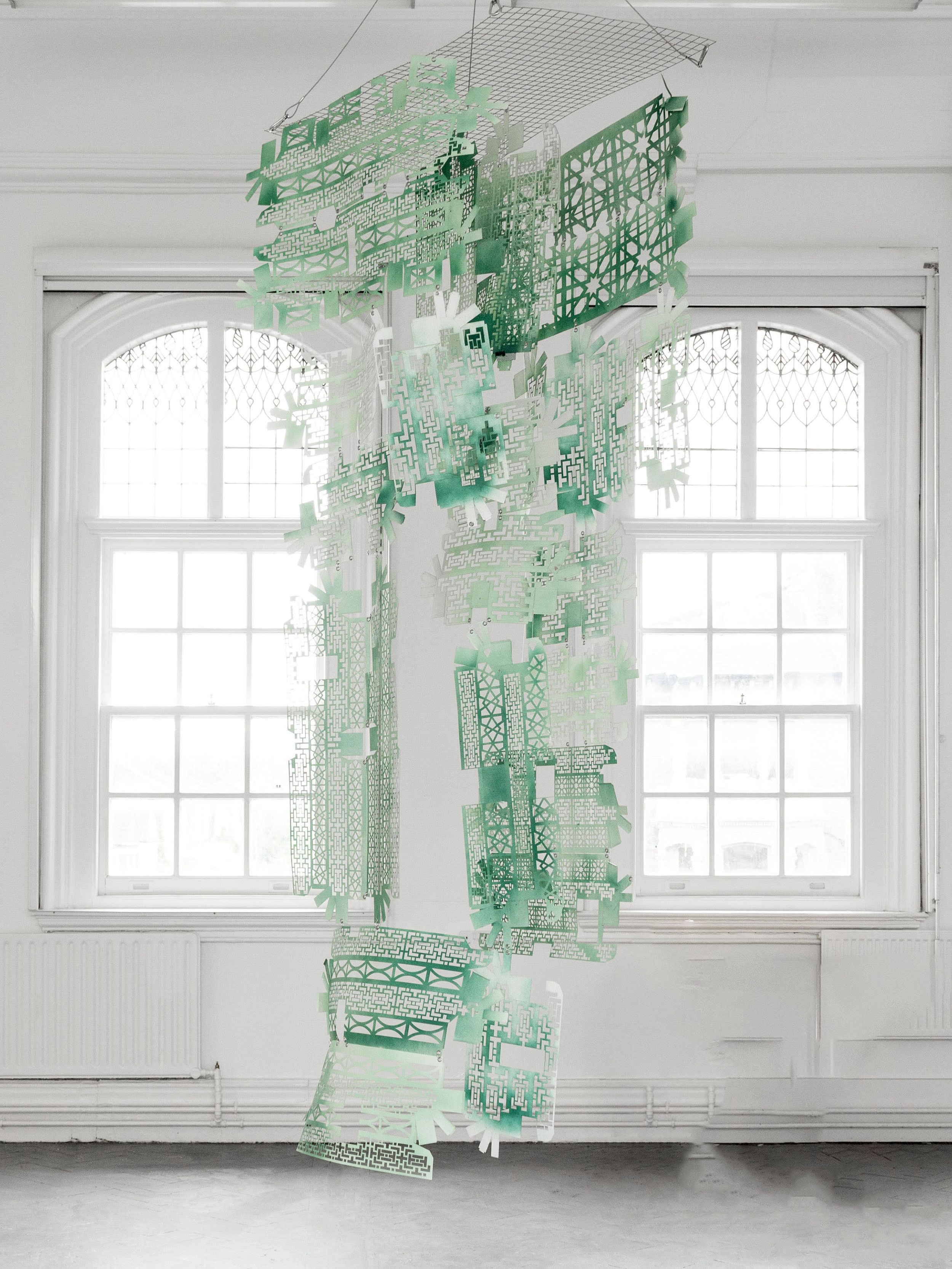 Between Places (In Construction)
Paper, Fishing Wire and Galvanised Steel Hooks, Mesh and Rings
250 x 60 x 90 cm
In Construction takes the form of a deconstructed wooden bracket (known as a dougong 斗拱). In Construction meditates a connection betwe