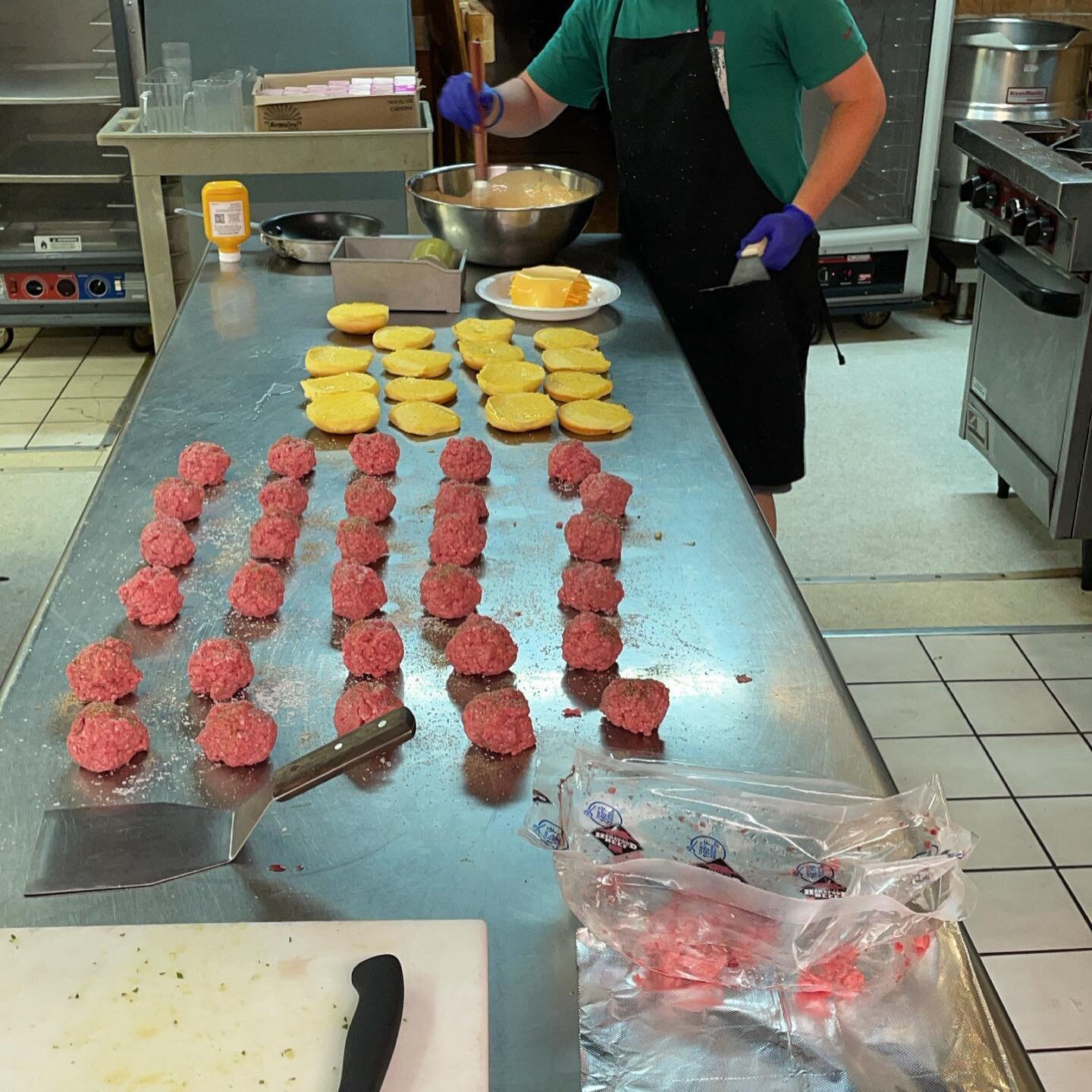 Working on the line.  30 burgers (extra sauce) ready to go.  Thanks for the opportunity Chef E! @etimroth @realbobdeutsch