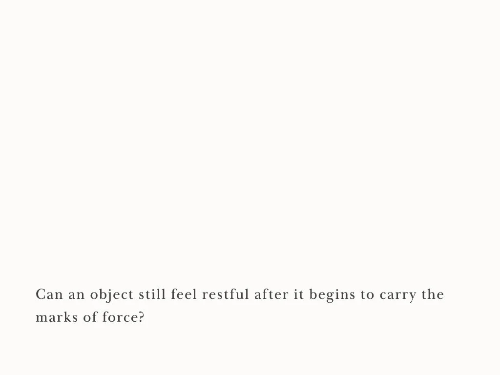 Can an object still feel restful after it begins to carry the marks of force?