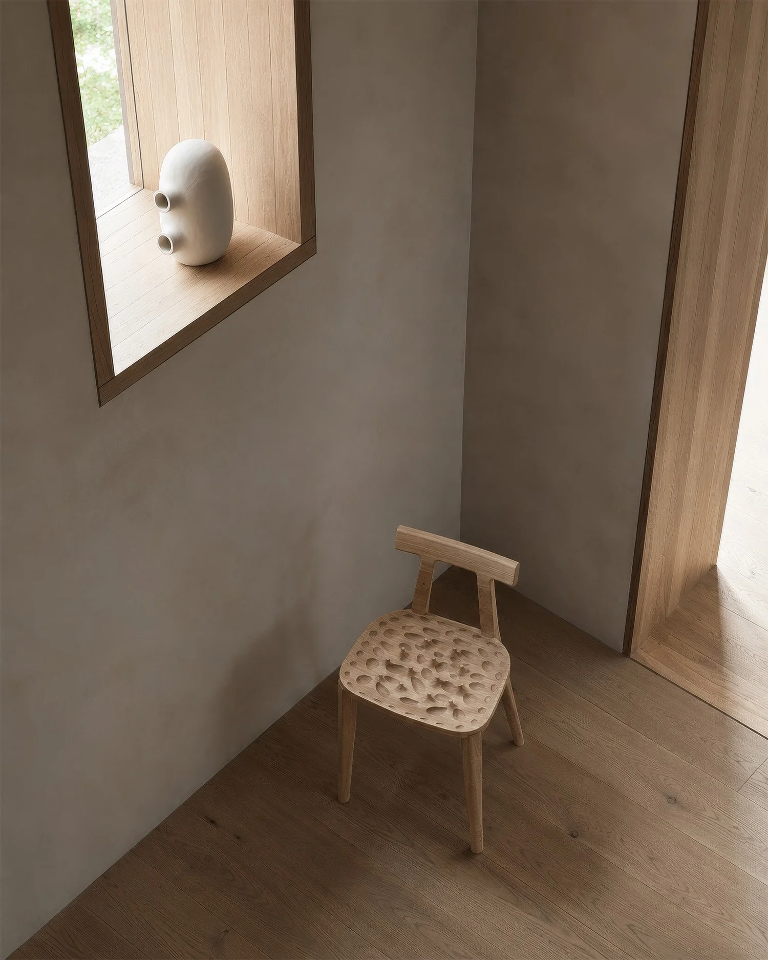 A vessel from the Jacob Vase series with the Perceptual Terrain Chair.