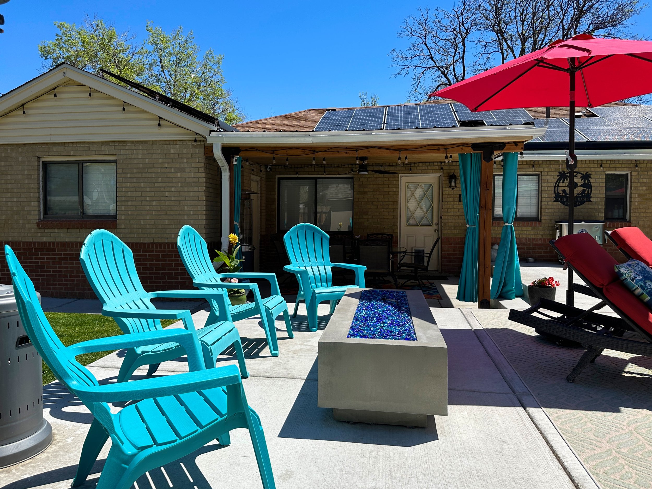 The newly added 6ft natural gas fire pit with gorgeous blue fire glass is a great addition to stay warm after the pool on those chillier Colorado days!
