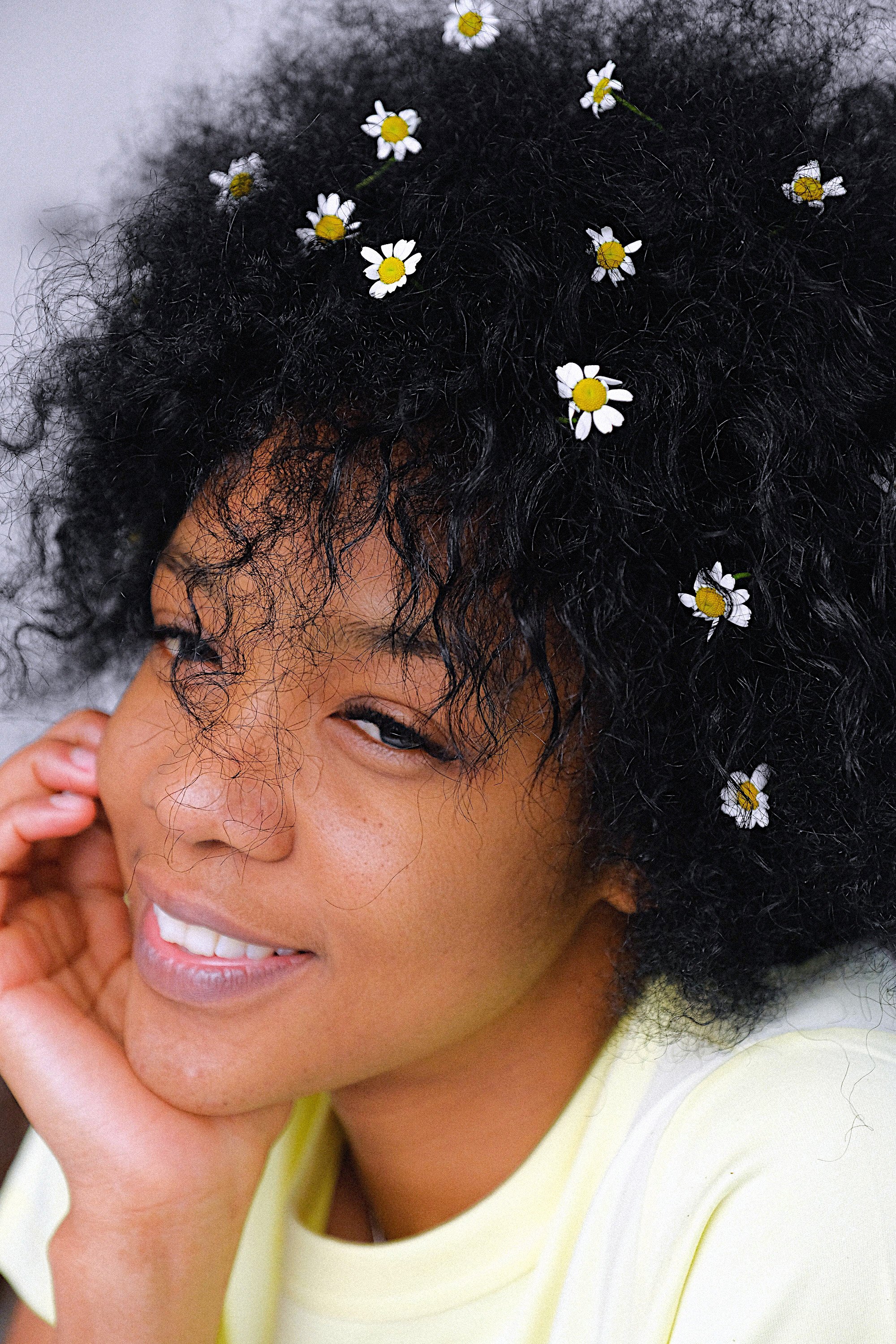 Woman Wearing Hair Accessories of Small Flowers.