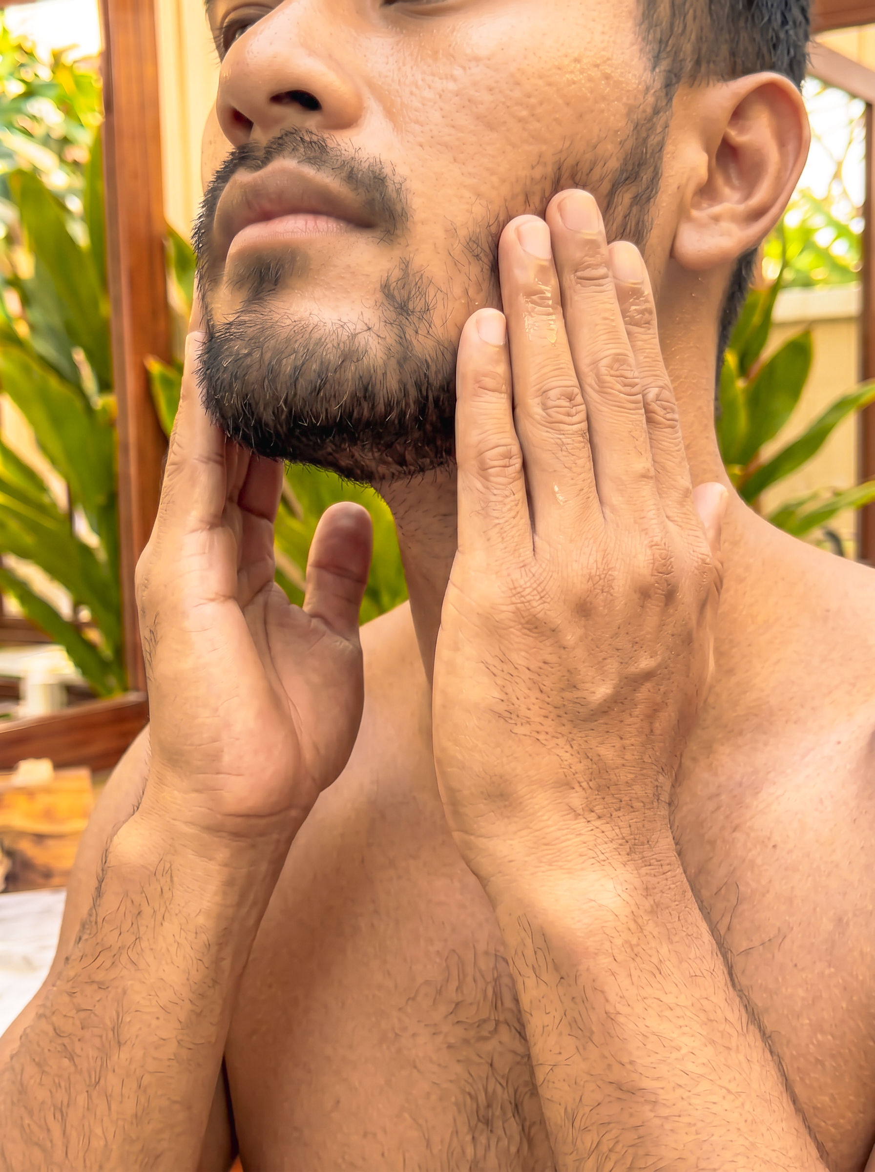 male model showing his healthy face skin and beard from using Kekoa Creative botanical natural skincare products