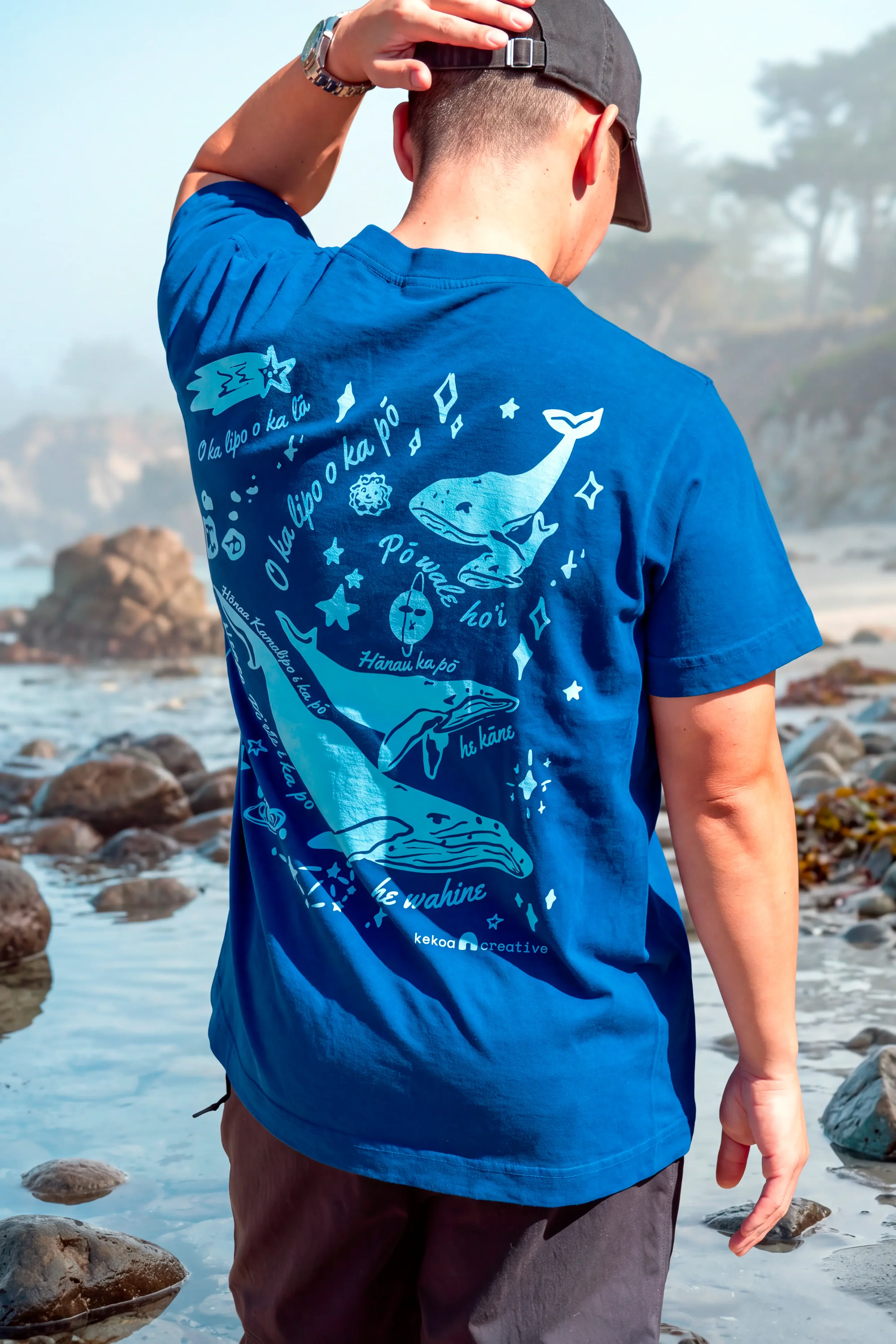 Back view of Kumulipo creation chant artwork with whale and celestial bodies printed in Blue Starlight water based ink.